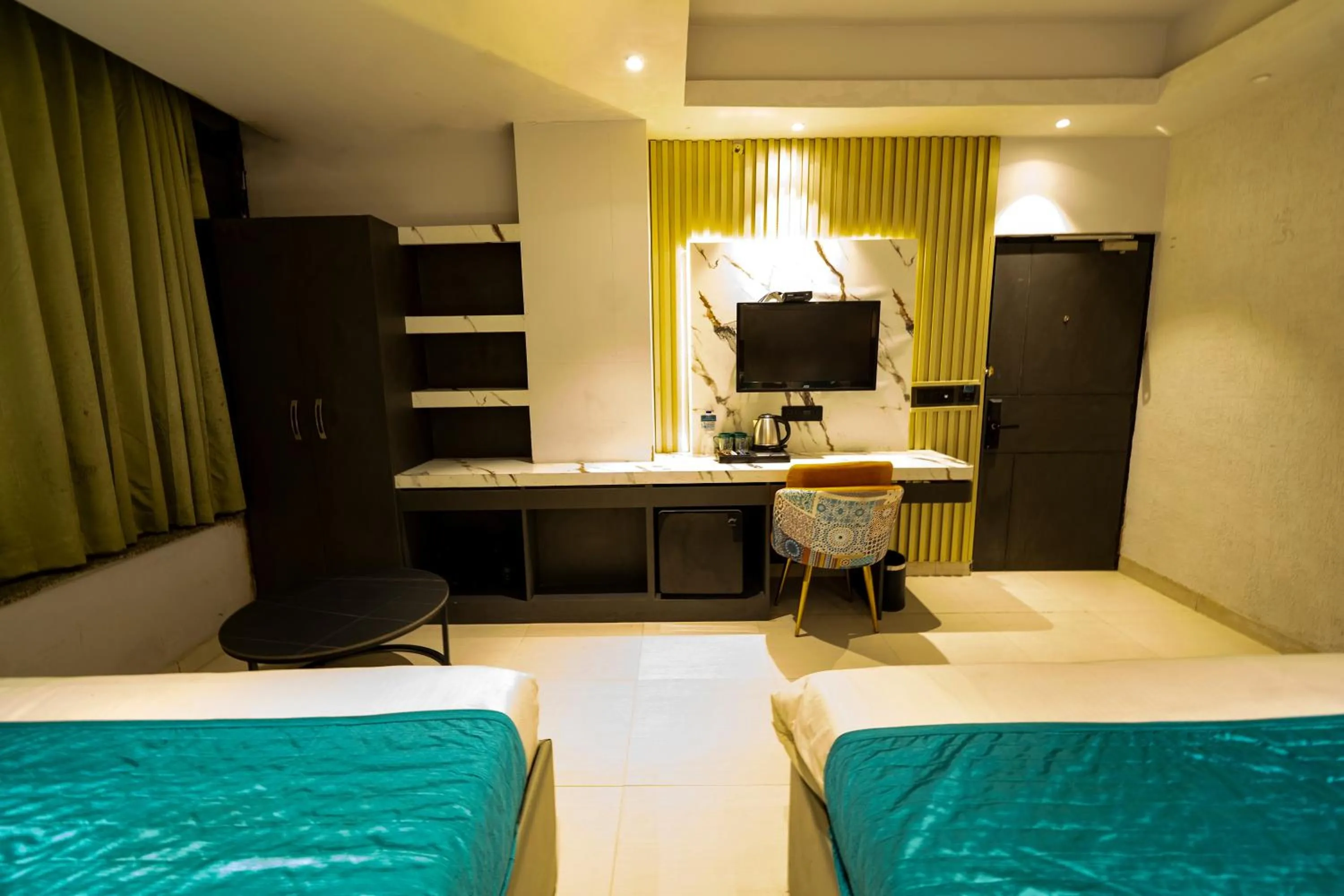 Communal lounge/ TV room, Bed in SKI Hotels and Resorts Rishikesh
