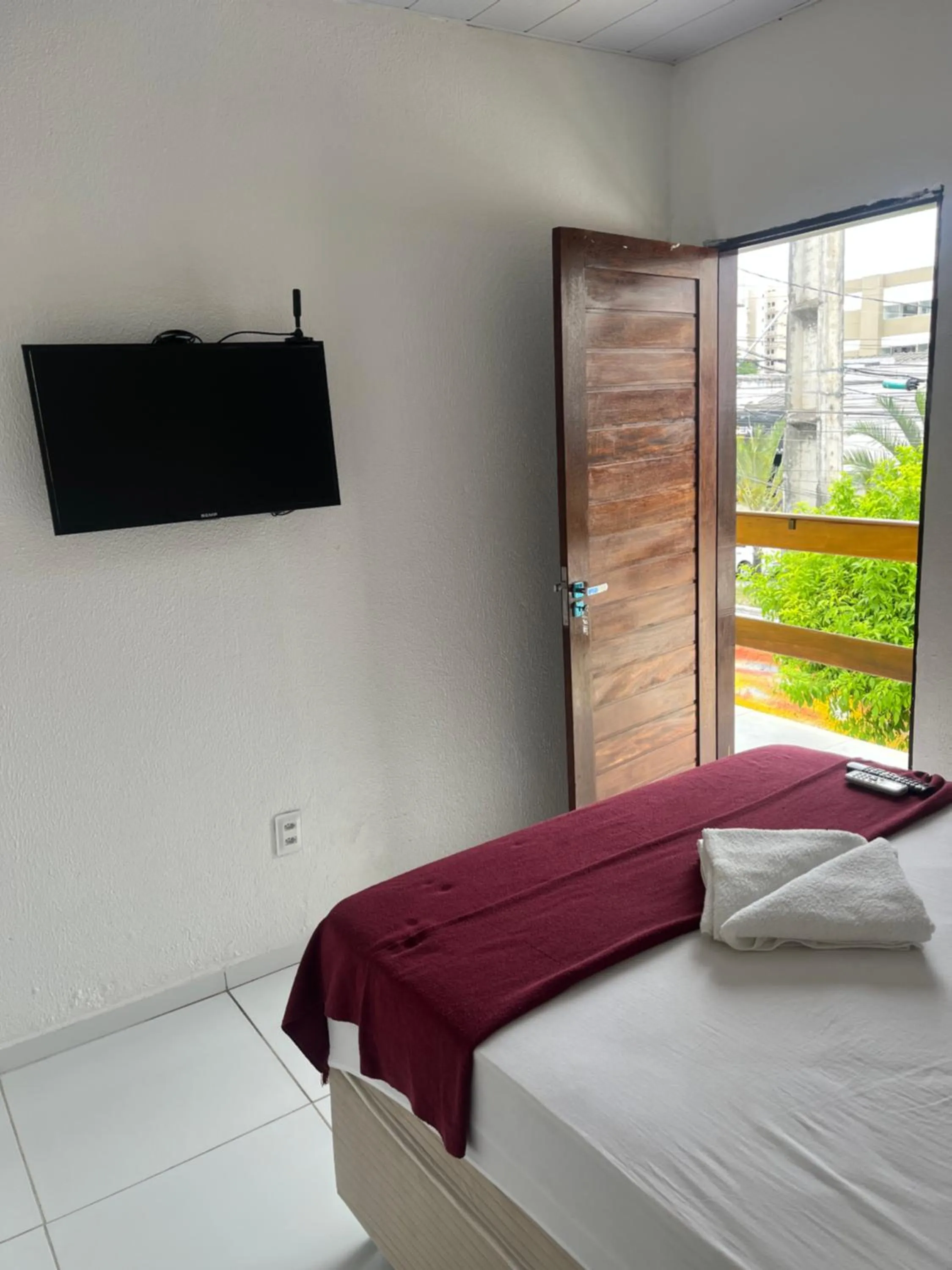 Bed in Pousada Água Viva