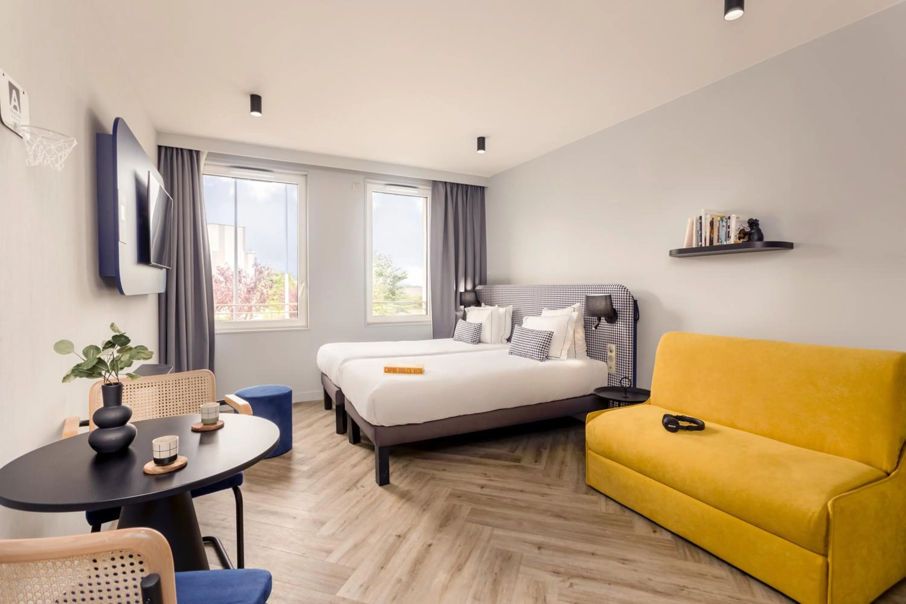 Bed in Appart'City Collection Paris Roissy CDG Airport