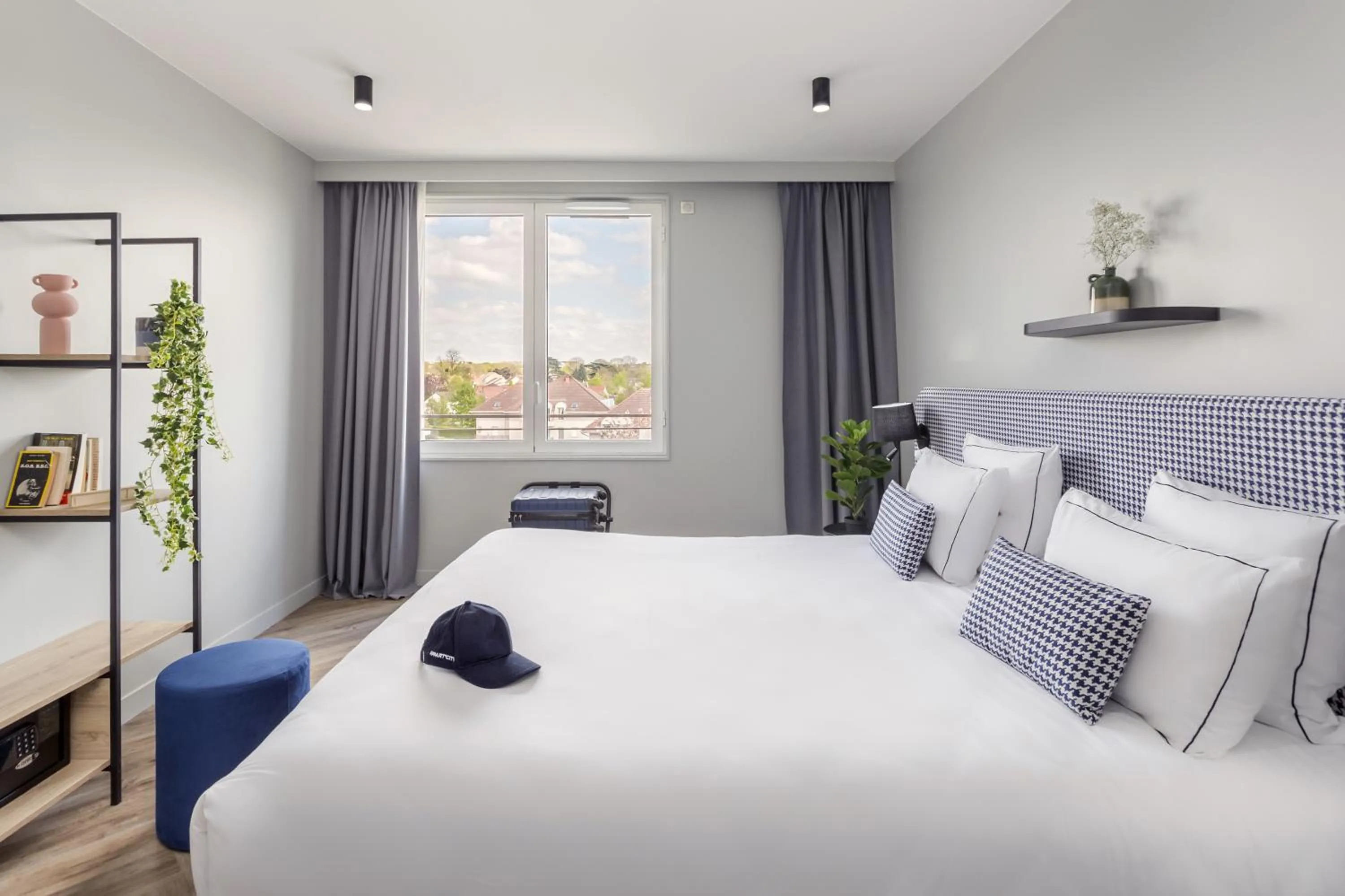 Bed in Appart'City Collection Paris Roissy CDG Airport