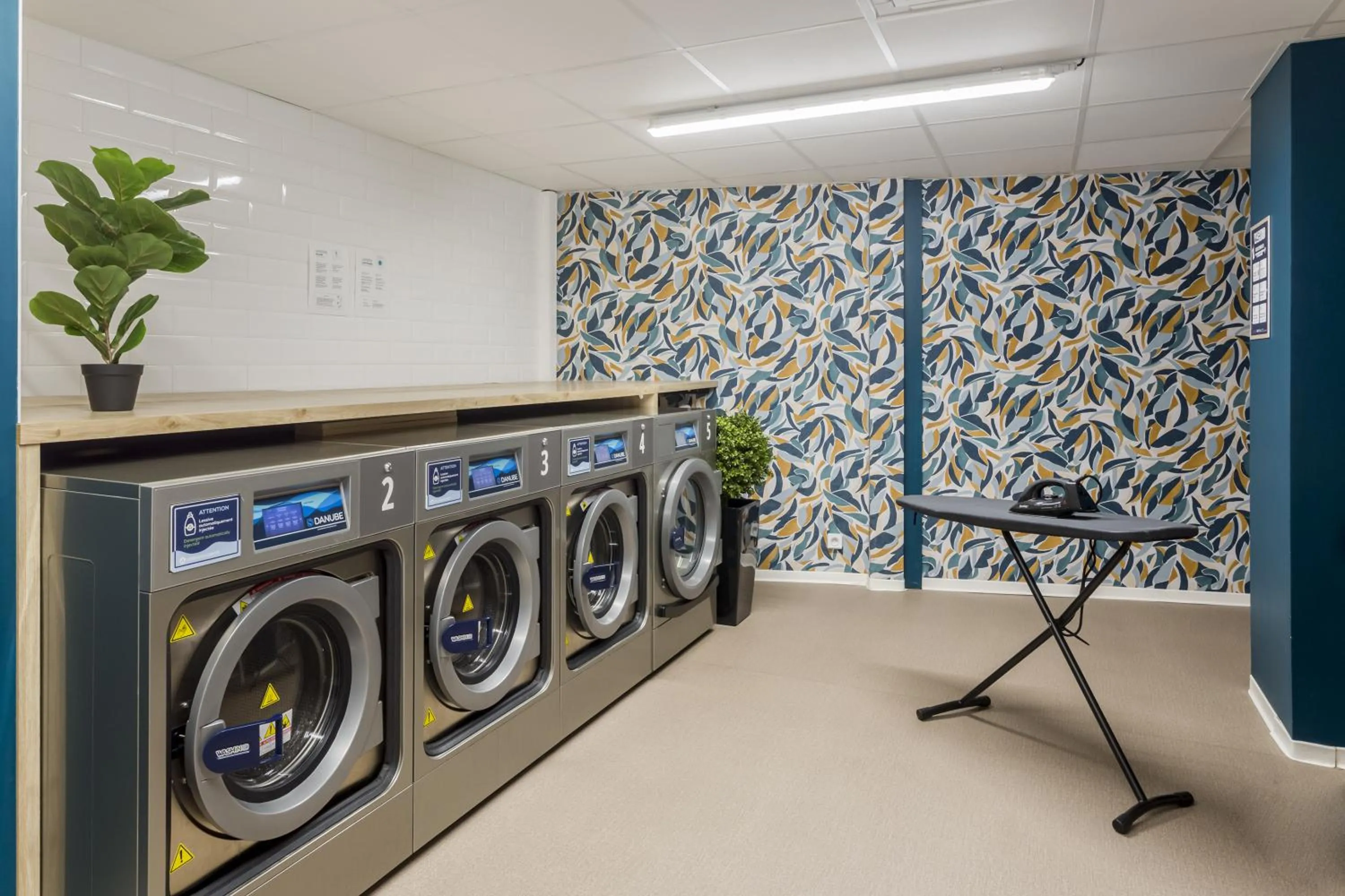 washing machine in Appart'City Collection Paris Roissy CDG Airport