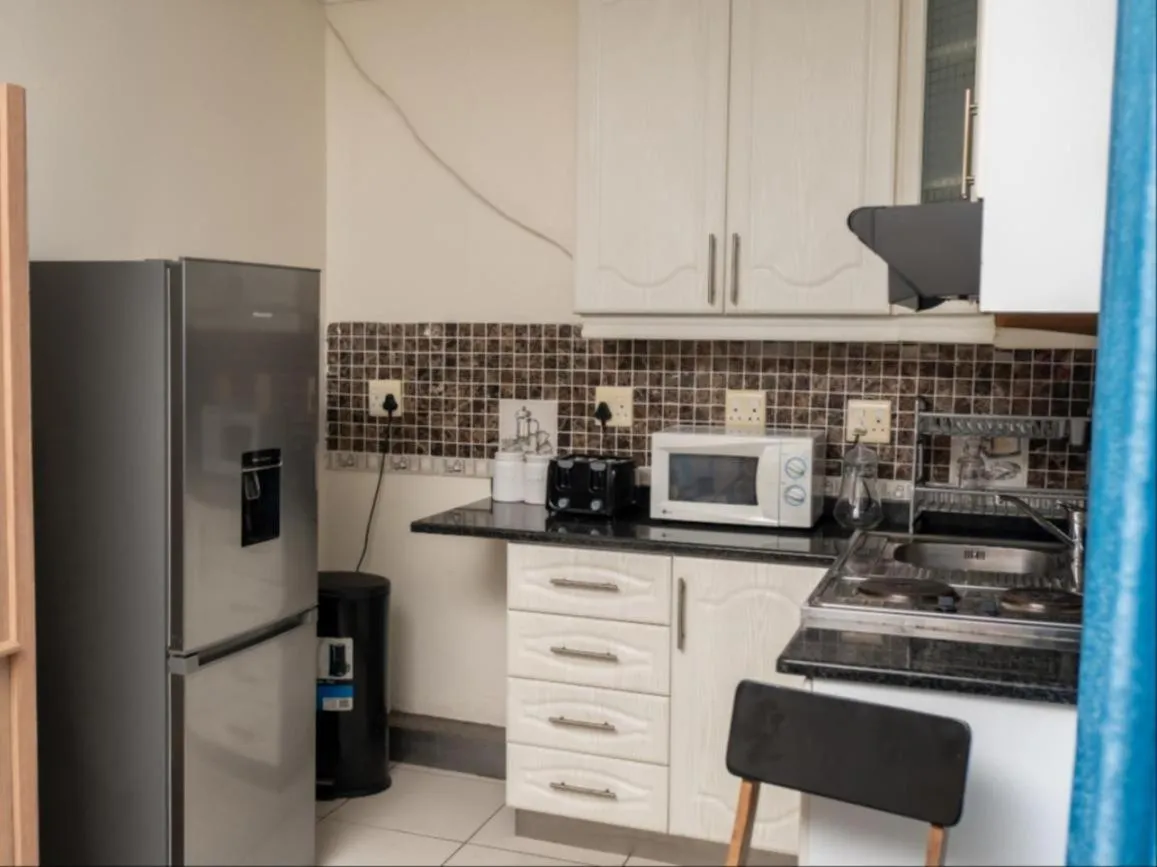 Kitchen or kitchenette in Dolphin Coast B&B / Self catering