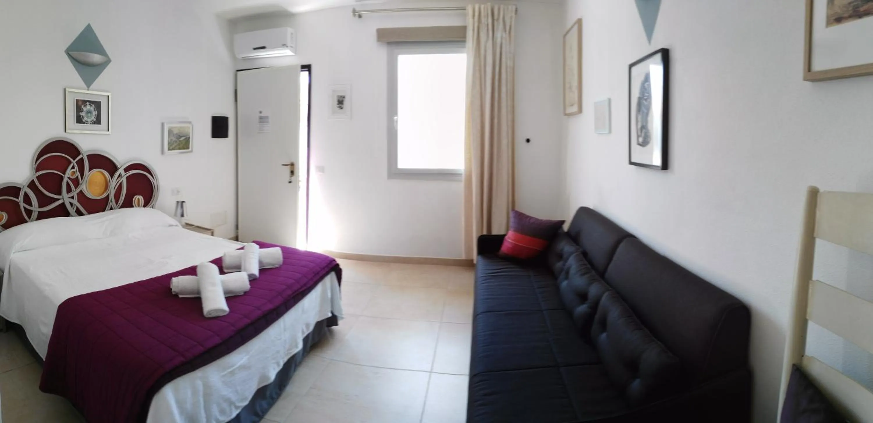 Bed in B&B Domus de Janas Santa Teresa Gallura