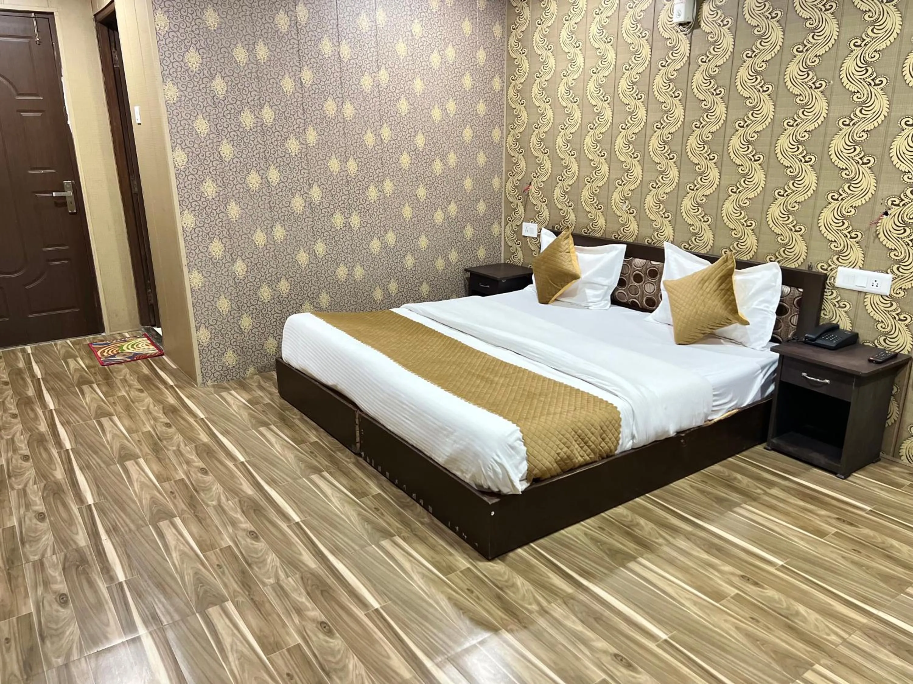 Bed in Hotel The Amar Grand