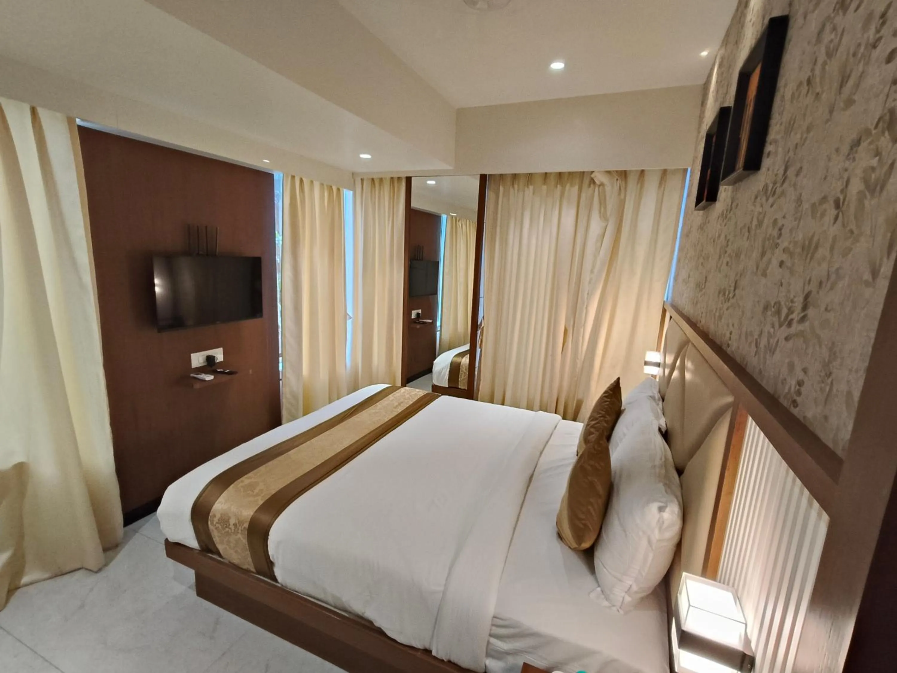 Photo of the whole room, Bed in Hotel Pearl Residency Thane