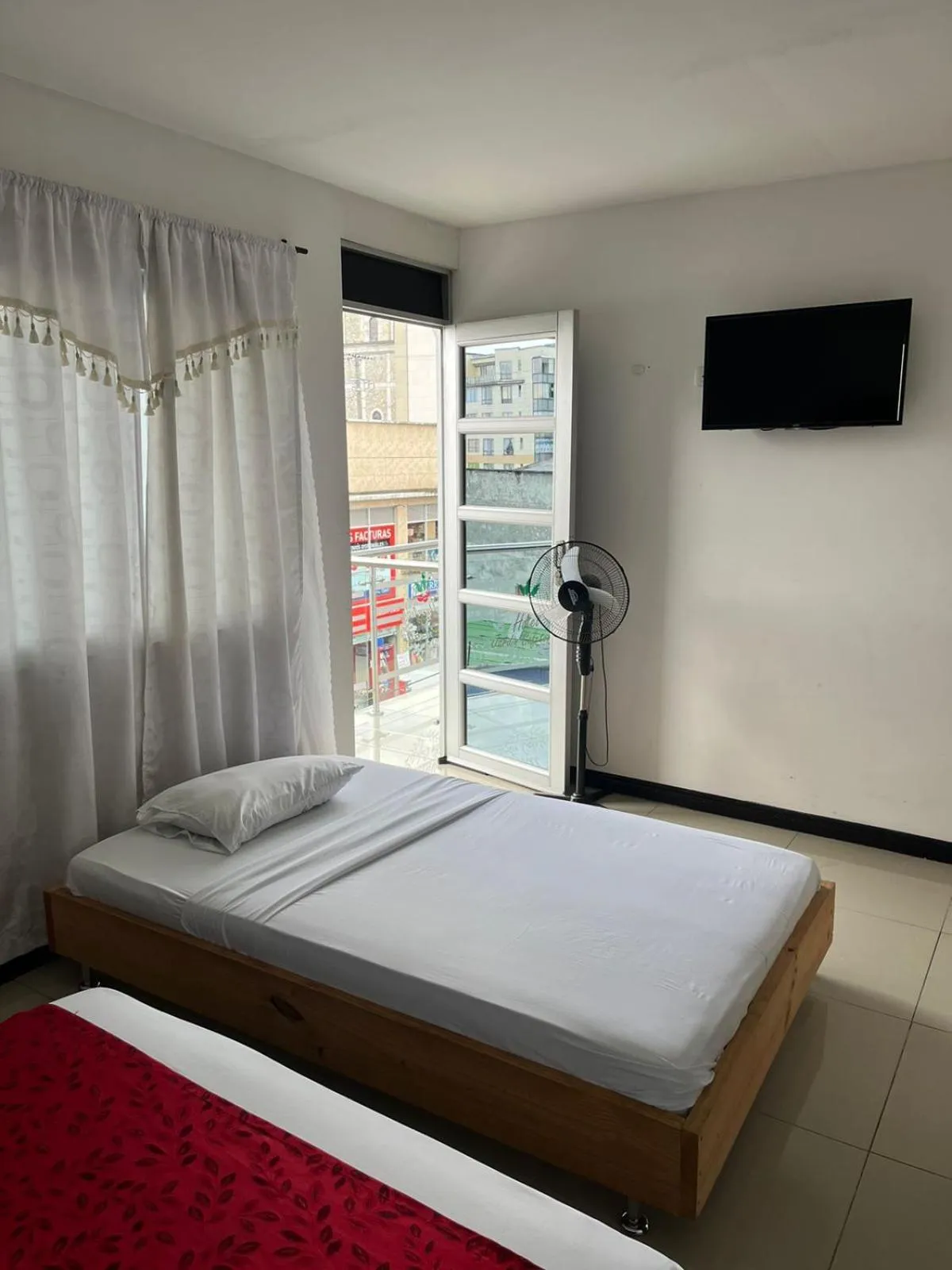 Photo of the whole room in Hotel El Jardín Cafetero Armenia