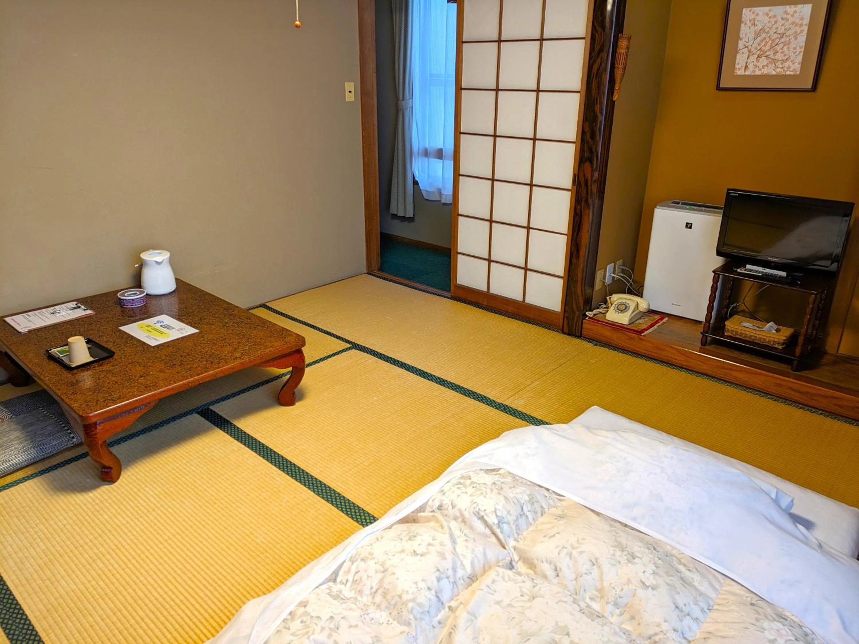 Bed in KULABO Taishokan