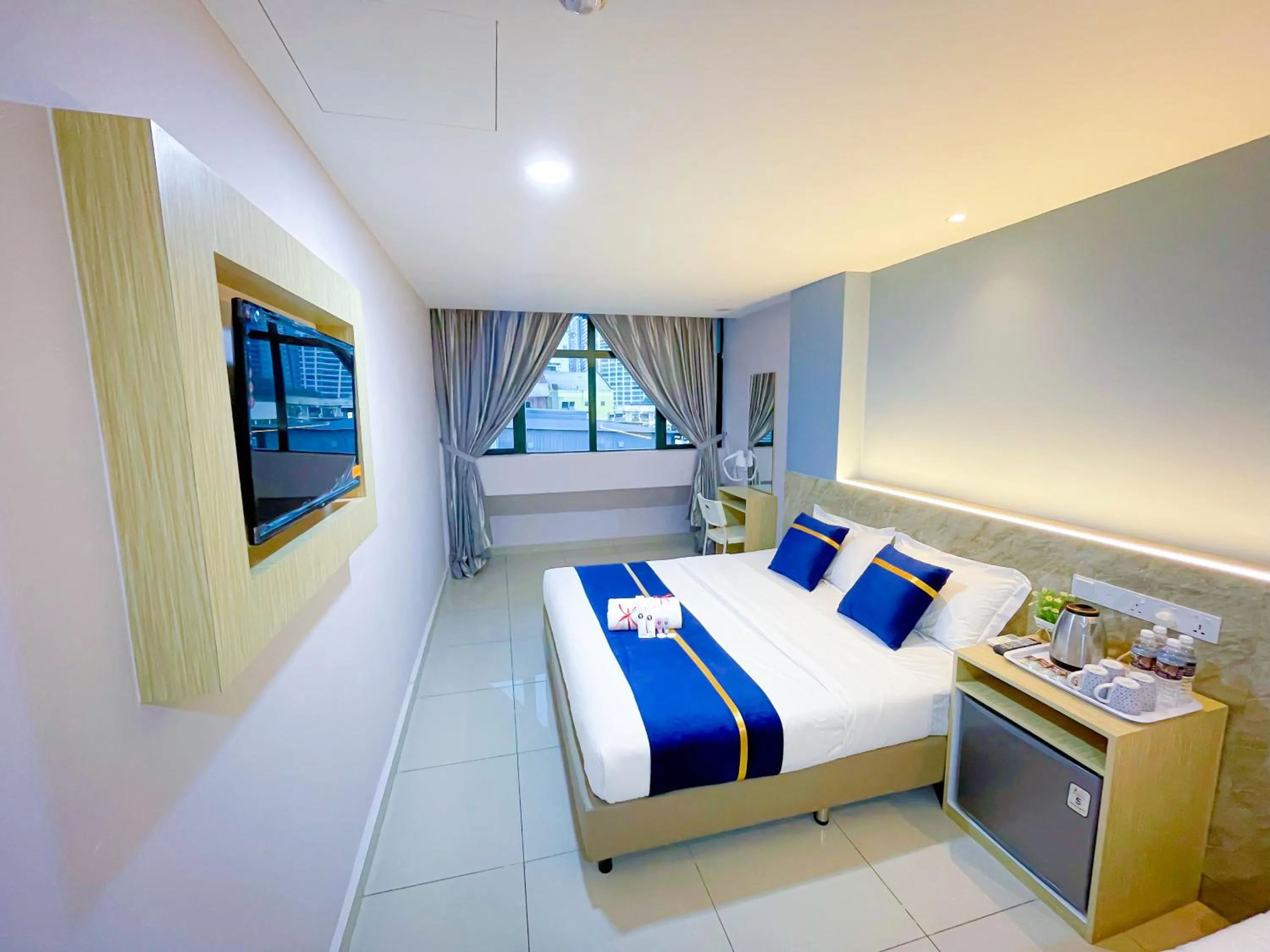 Bed in StarQ Hotel Kuala Lumpur