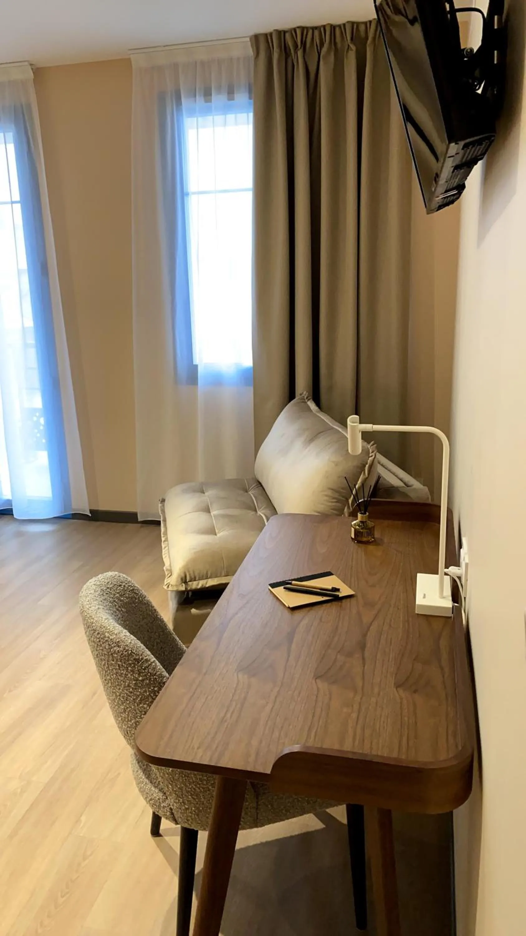 Living room in Hôtel du Commerce-restaurant au Couteau