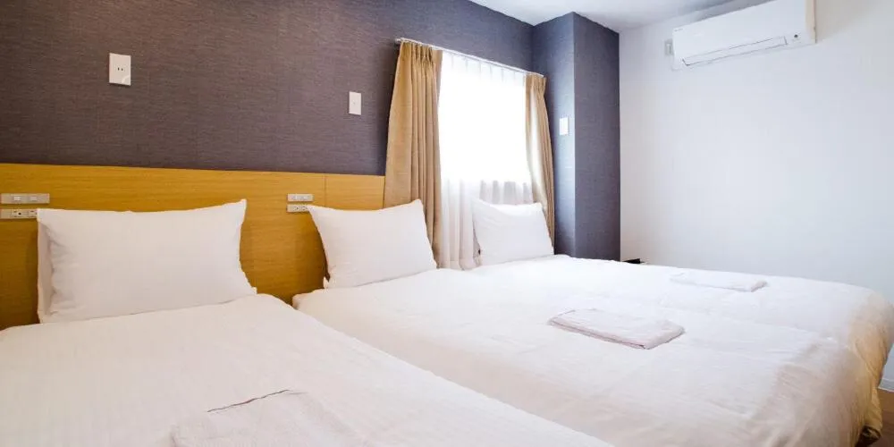 Bed in Rembrandt inn Aomori