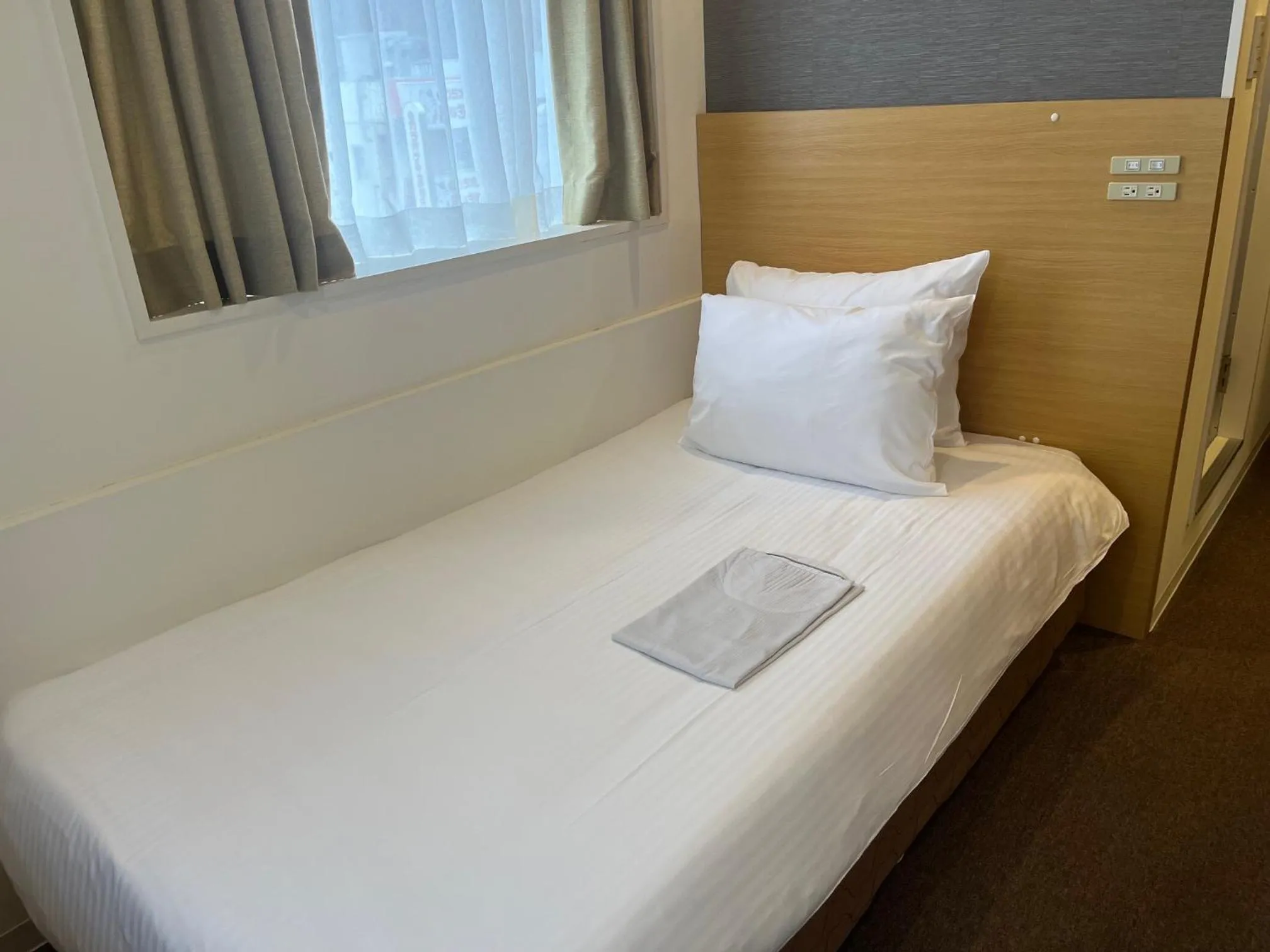 Bed in Rembrandt inn Aomori