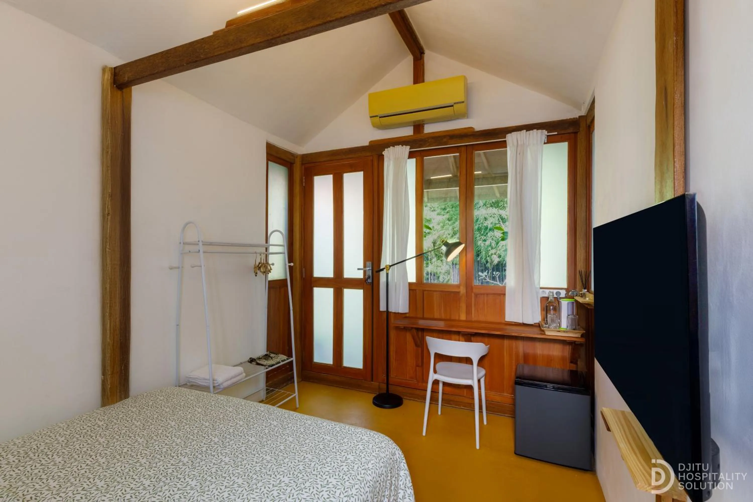 Bed in Yukke Tembi Homestay