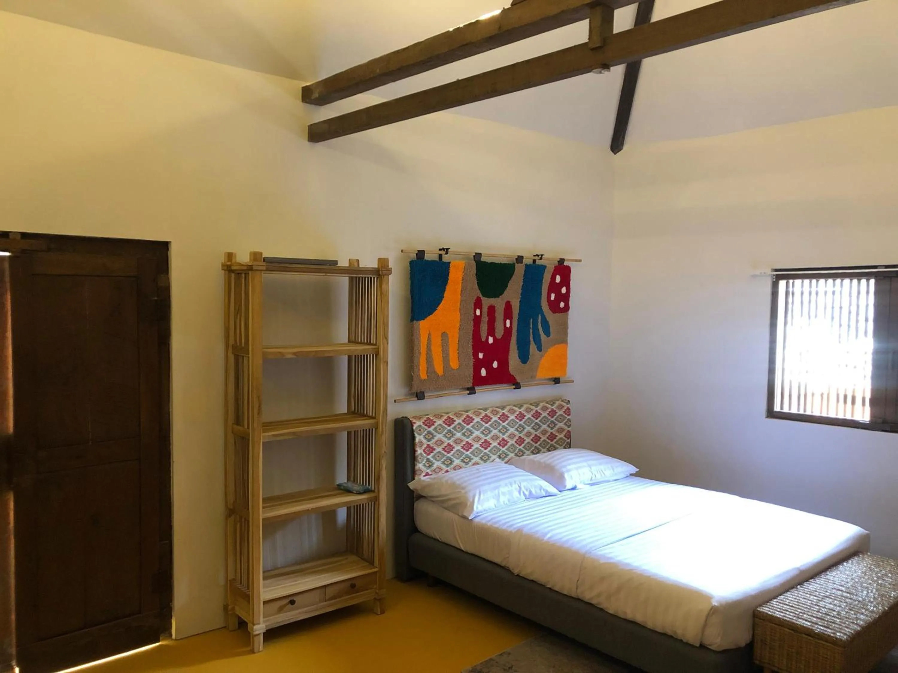 Bed in Yukke Tembi Homestay