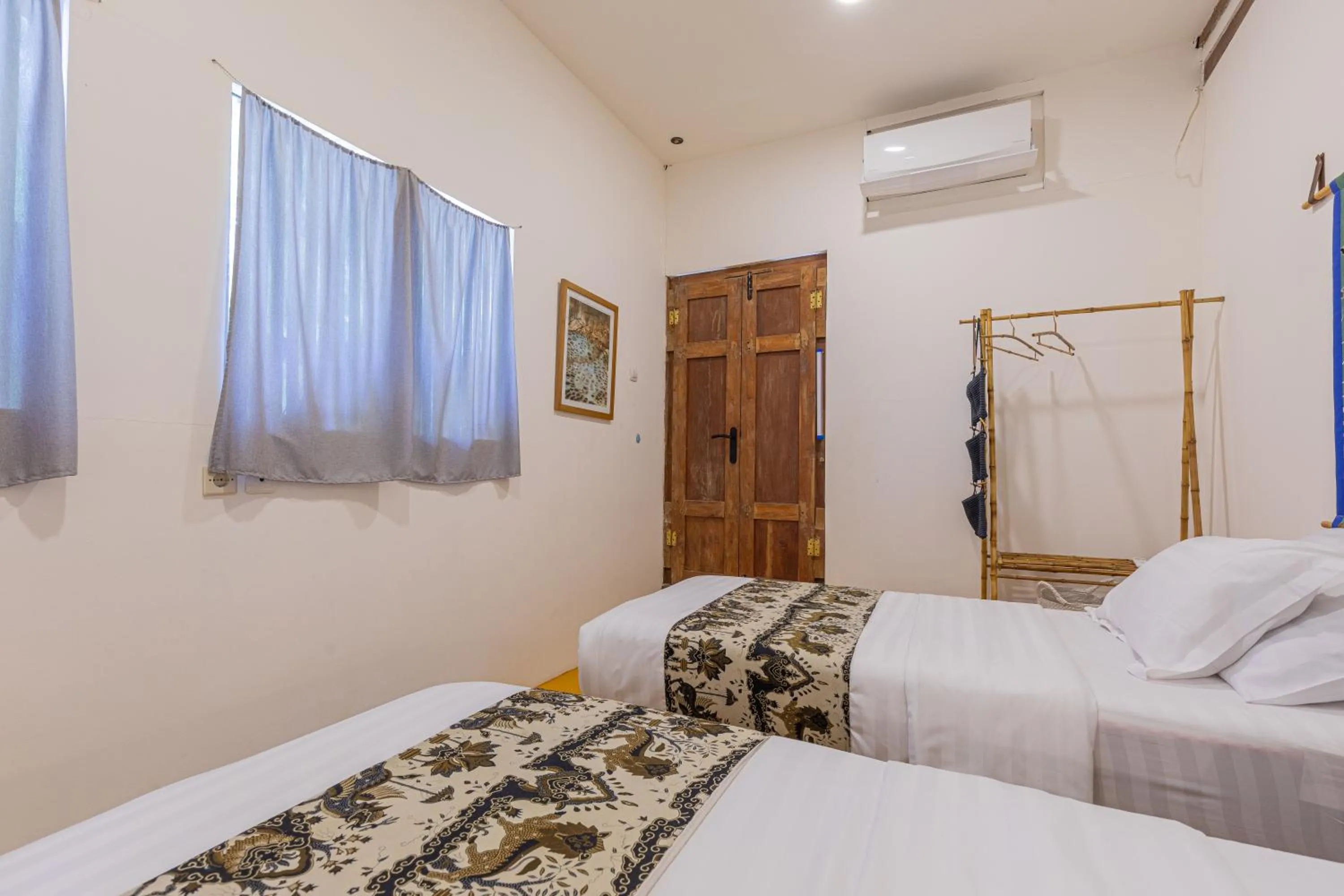 Bed in Yukke Tembi Homestay