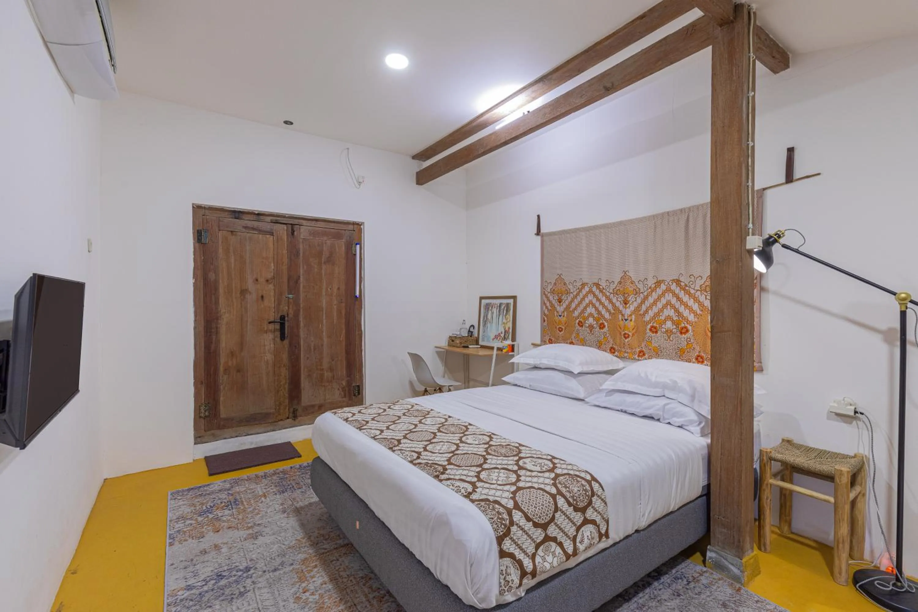 Bed in Yukke Tembi Homestay