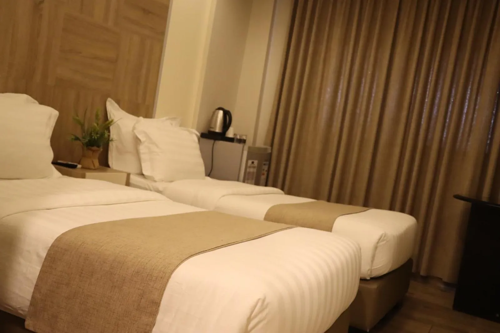 Bed in Alena Boutique Hotel