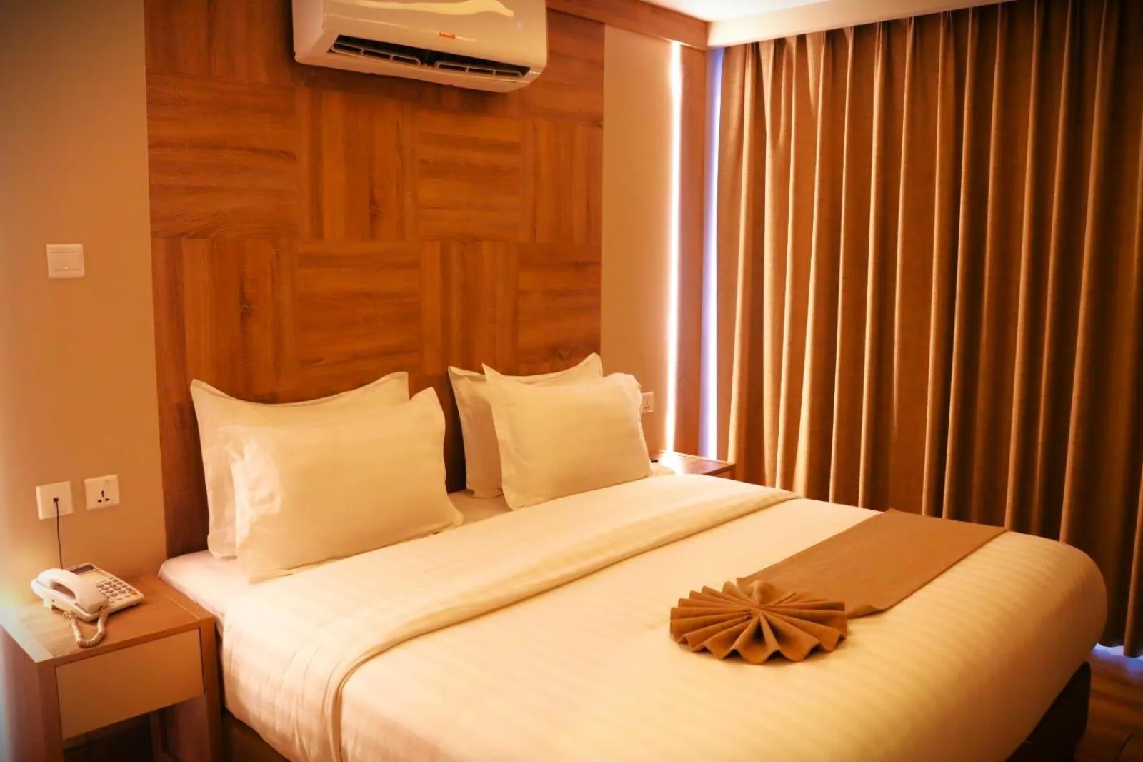 Bed in Alena Boutique Hotel