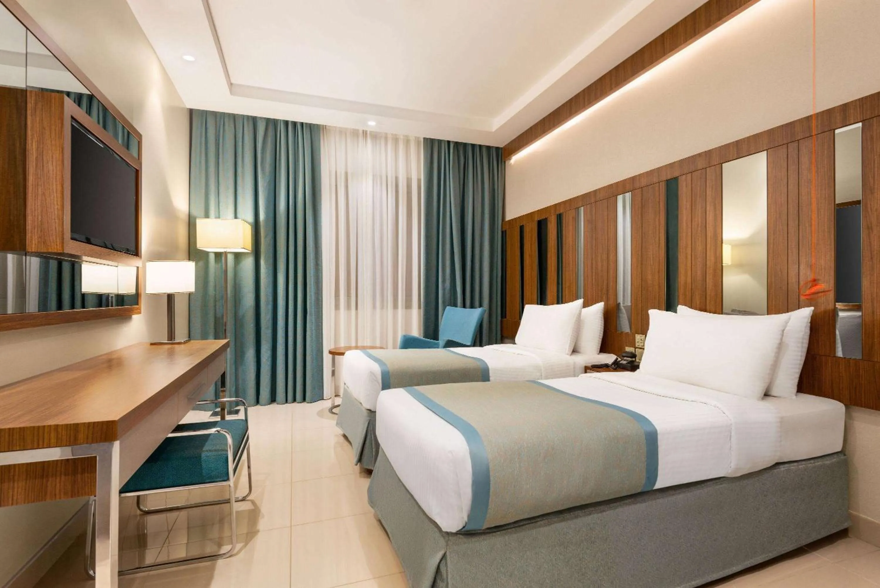 Photo of the whole room, Bed in Ramada by Wyndham Makkah Zad Al Tayseer