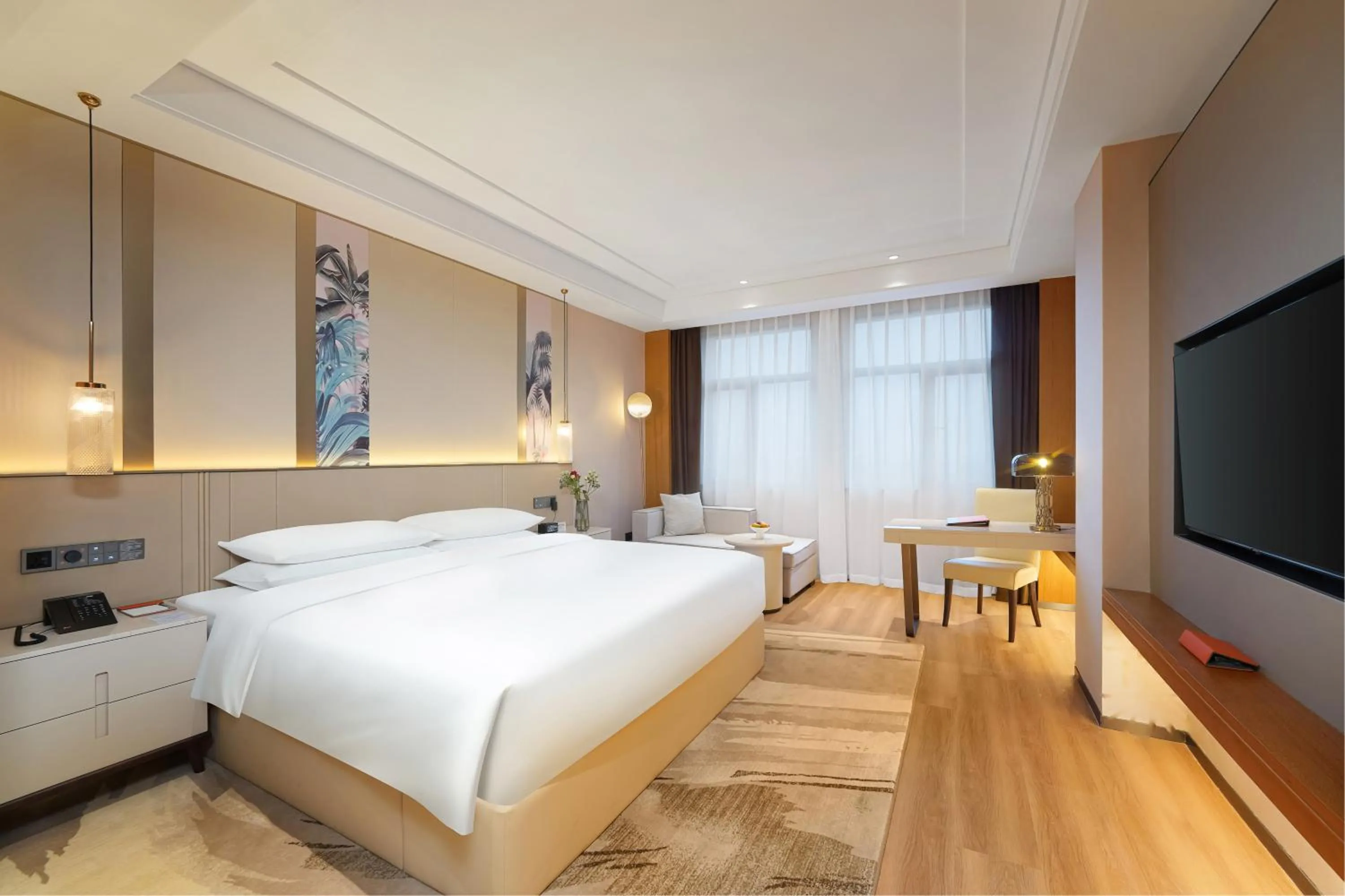 Bed in Howard Johnson by Wyndham Huaqiao Plaza Xinyu