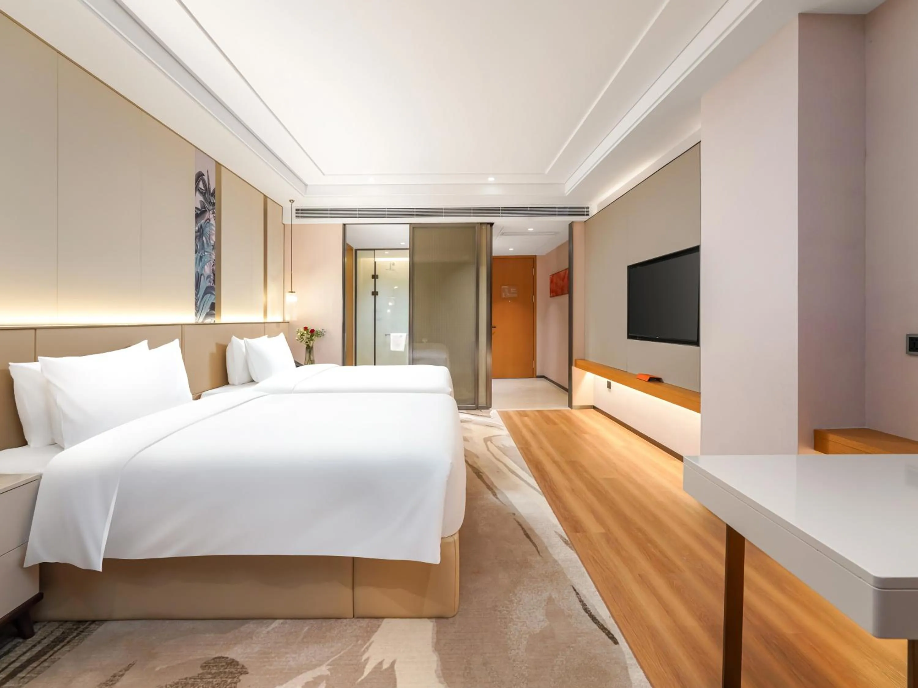 Bed in Howard Johnson by Wyndham Huaqiao Plaza Xinyu