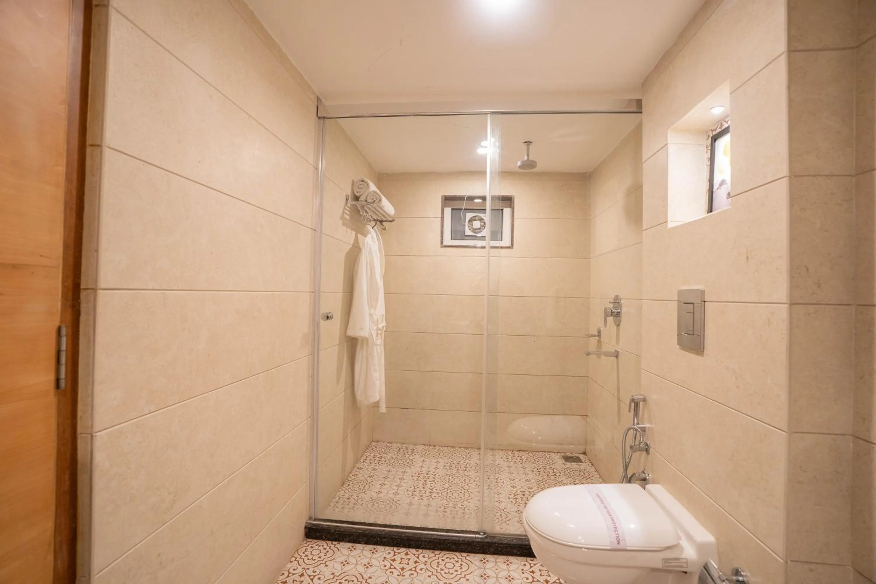 Shower in Super Hotel by Perfectstayz Mall Road