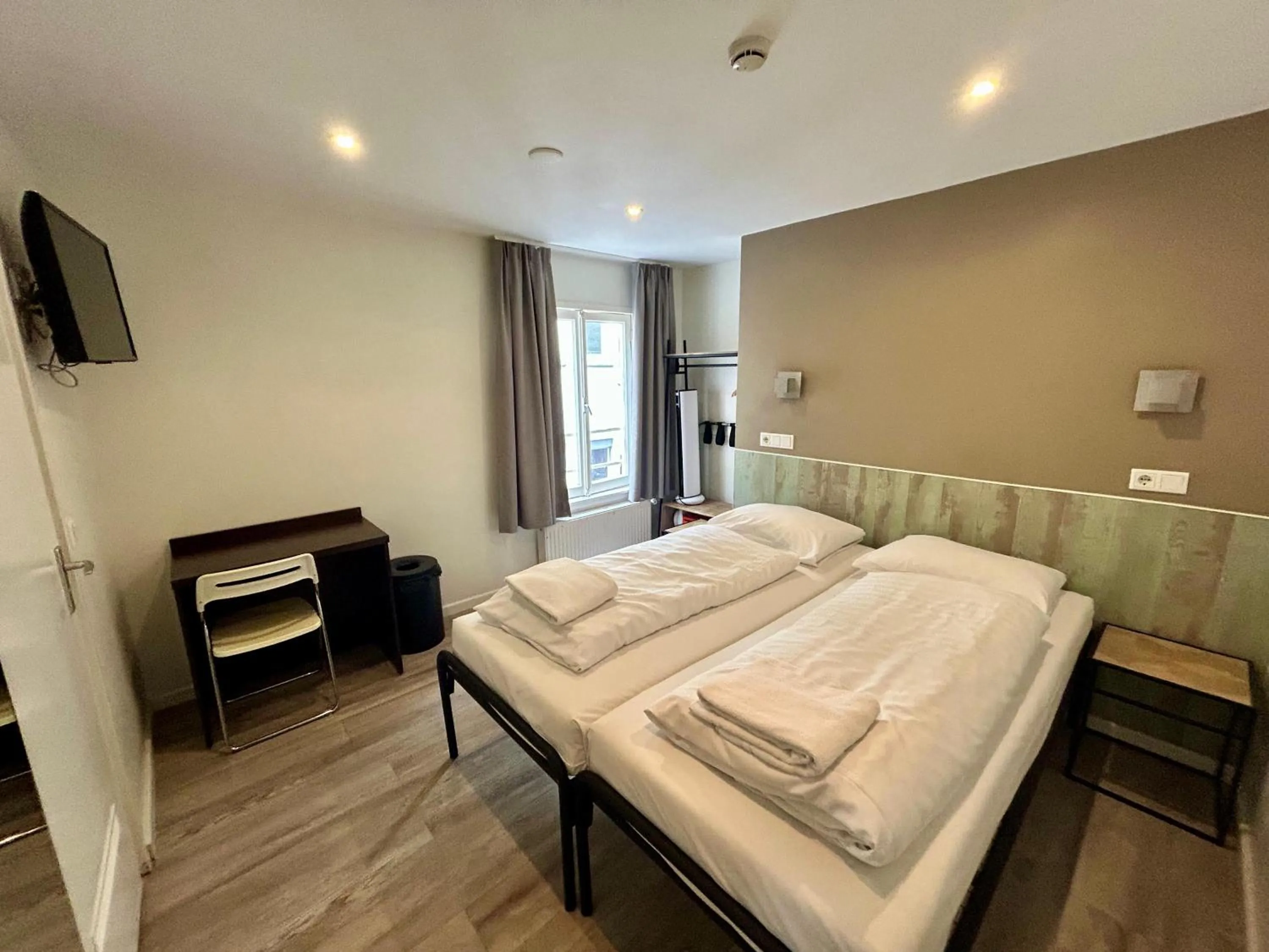 Bed in Hotel Damrak Inn