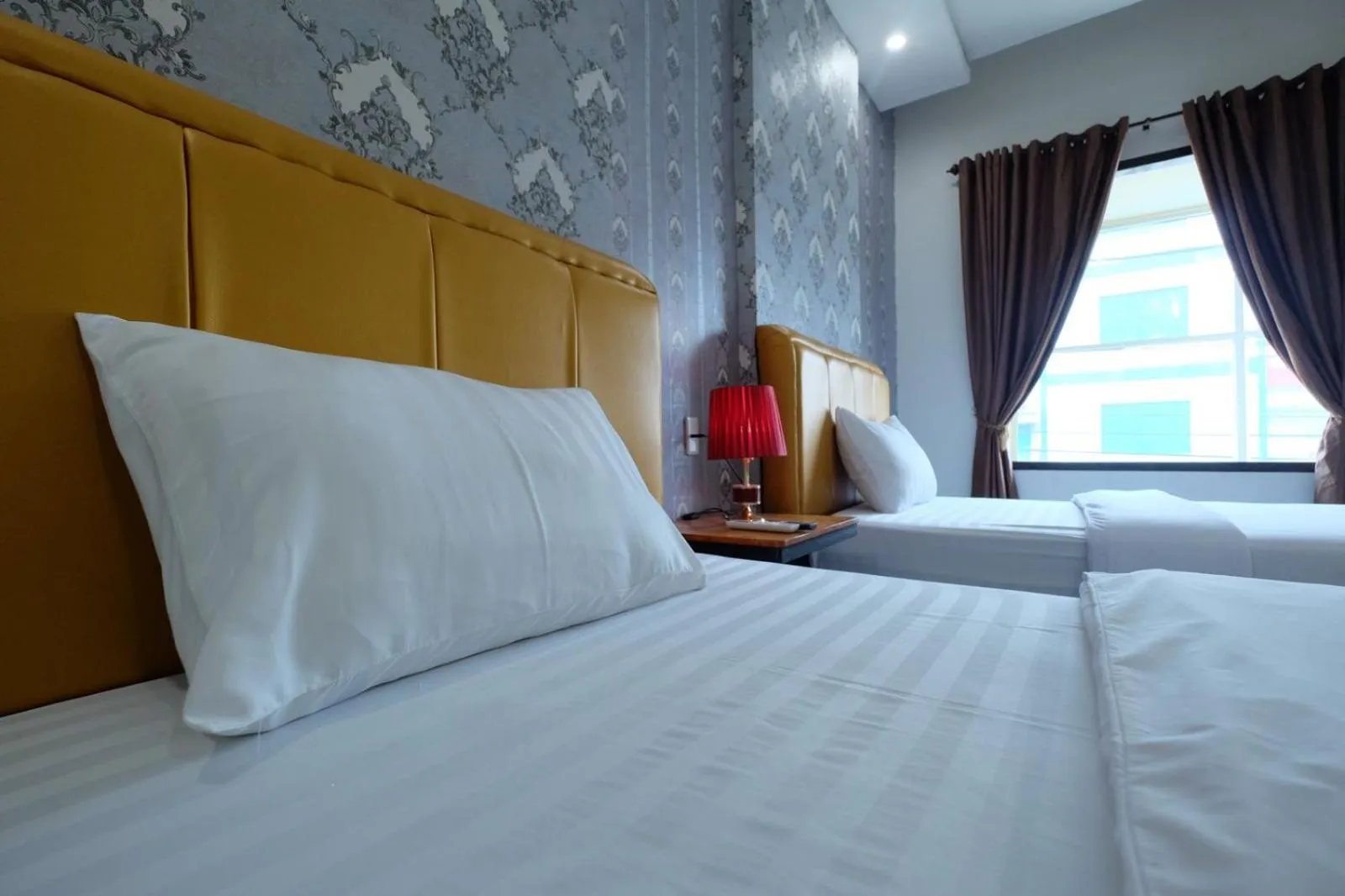 Bed in Grand Mulia Hotel Kisaran