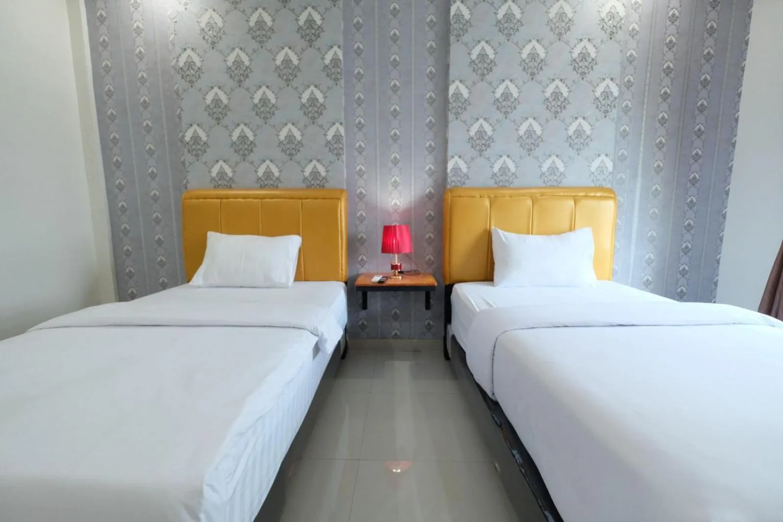 Bed in Grand Mulia Hotel Kisaran