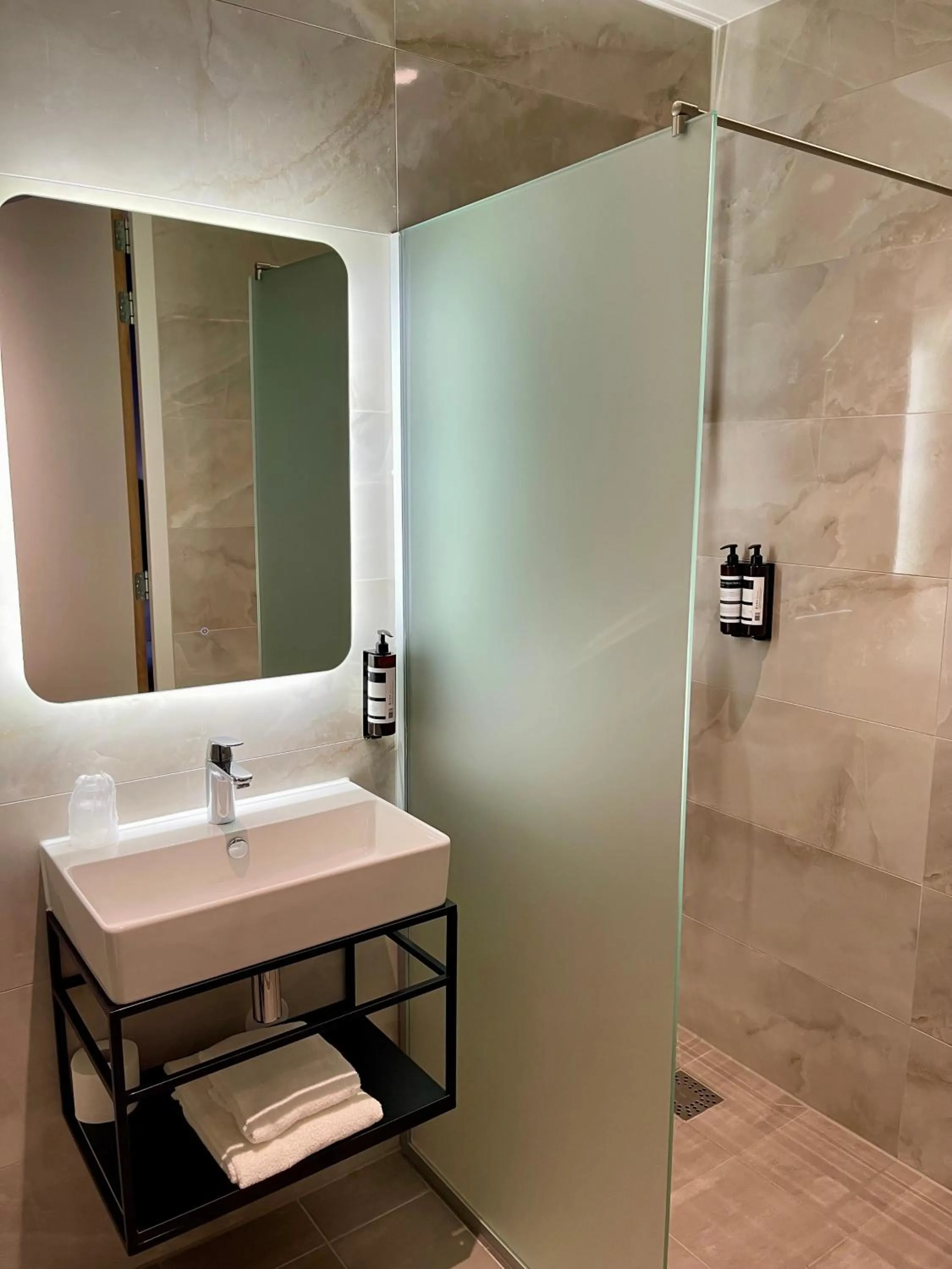 Bathroom in OZO Hotels Antares Airport