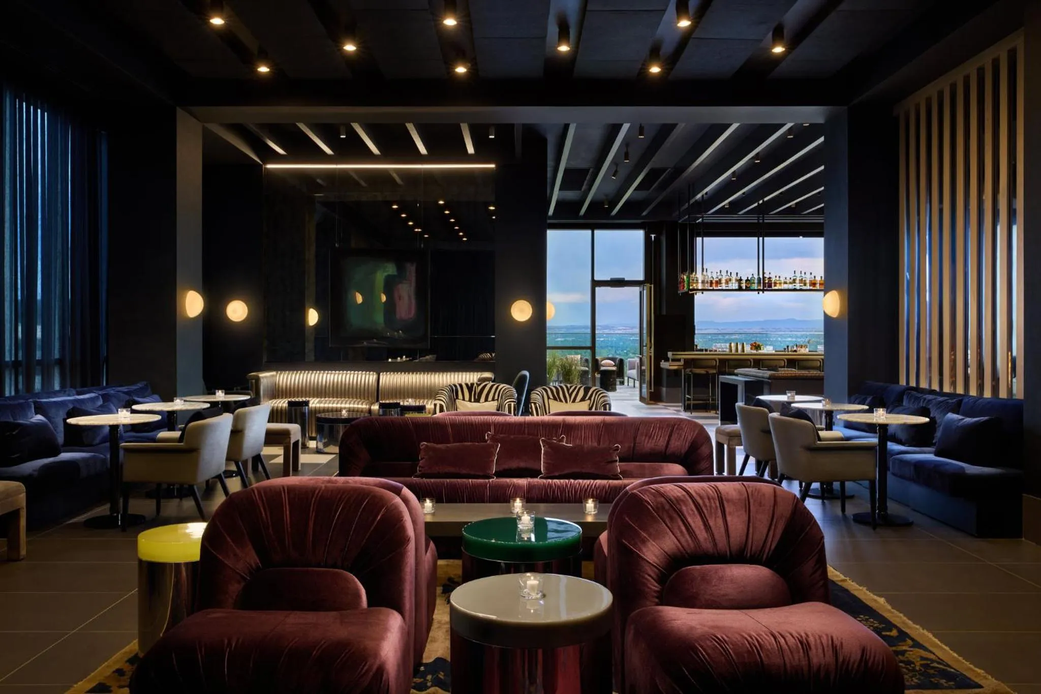 Lounge or bar in Kimpton Claret Hotel by IHG