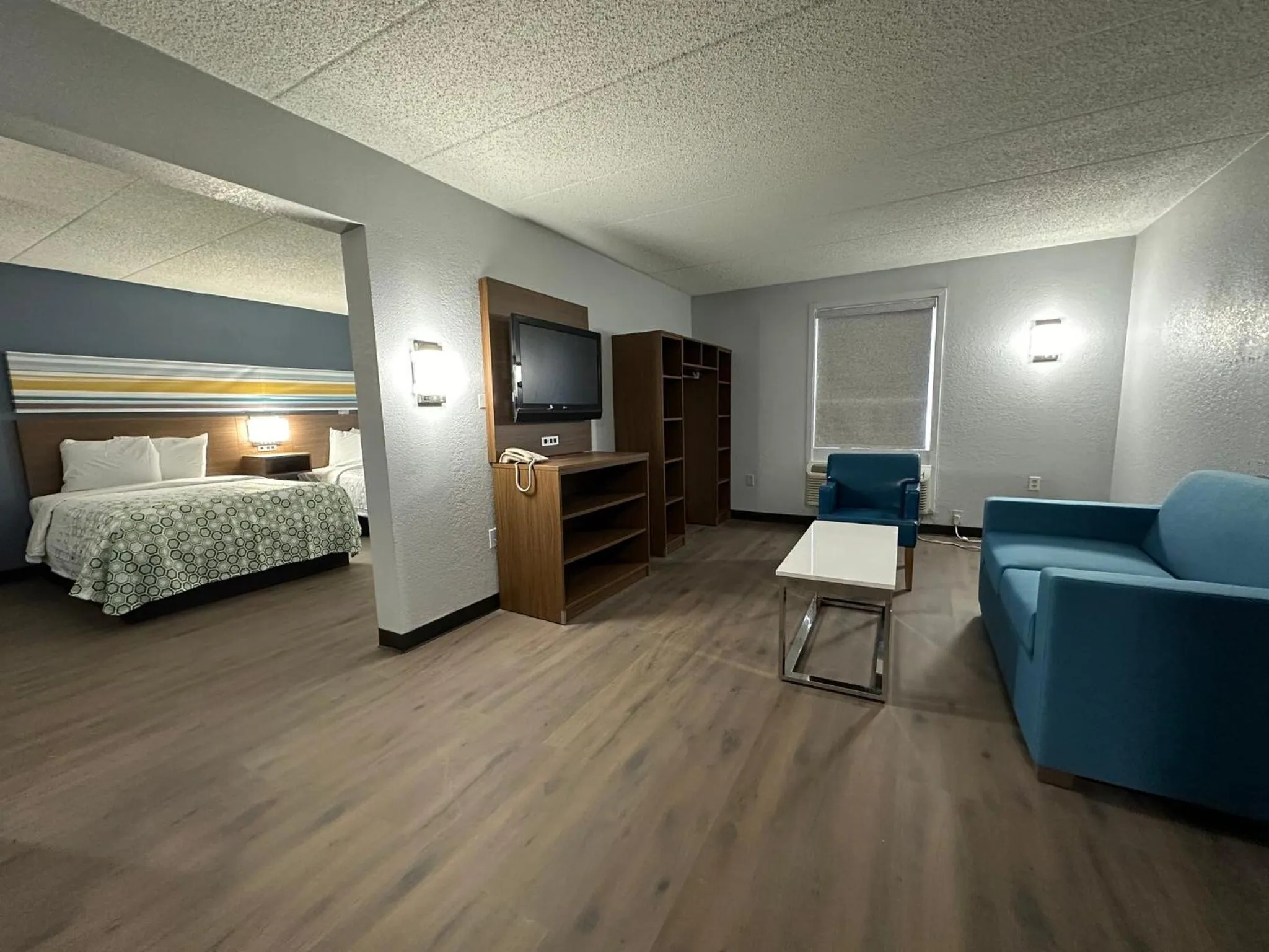 Photo of the whole room, Bed in HomeTowne Studios by Red Roof Richmond, VA - W Broad St