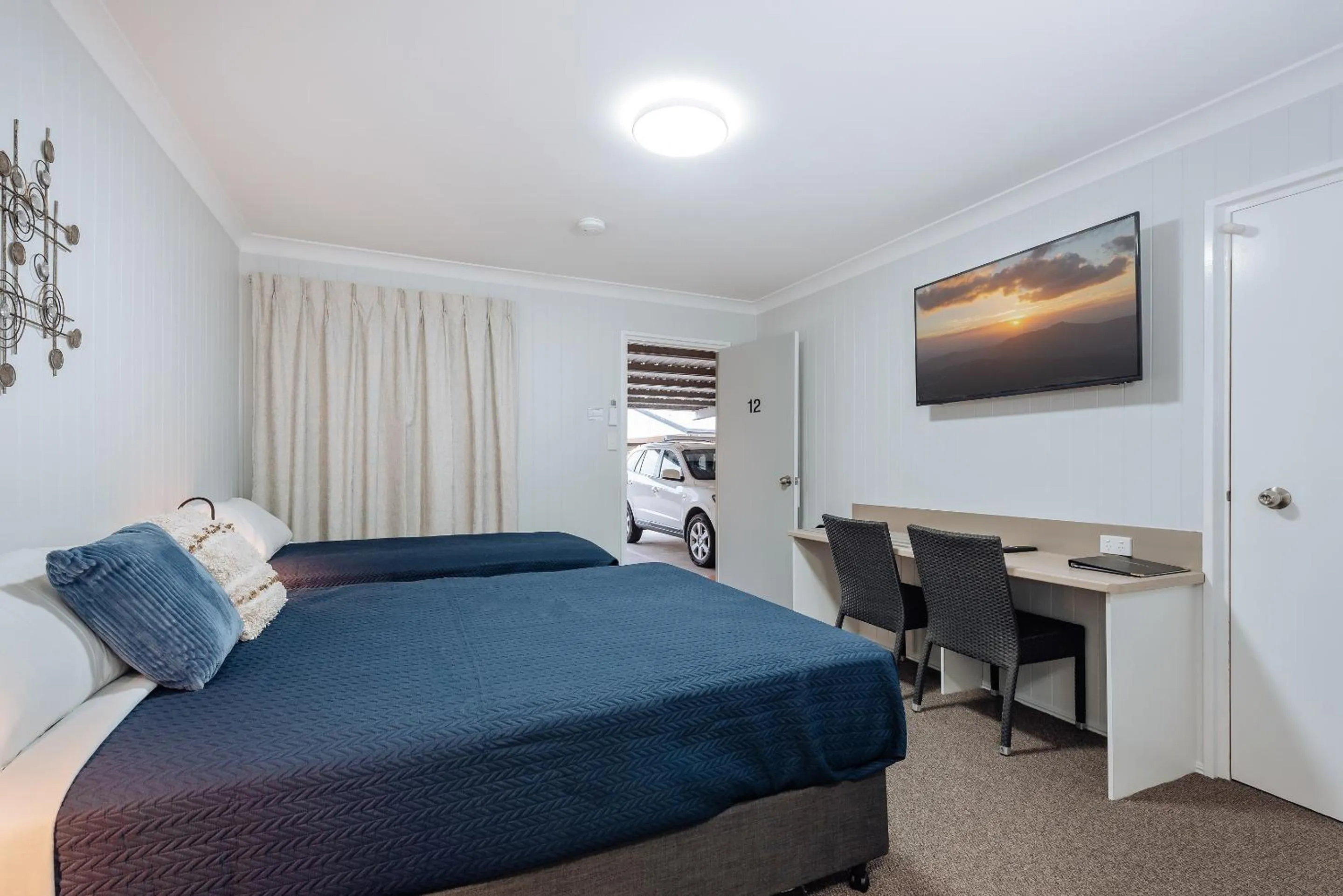 Bed in Raintree Motel Biloela