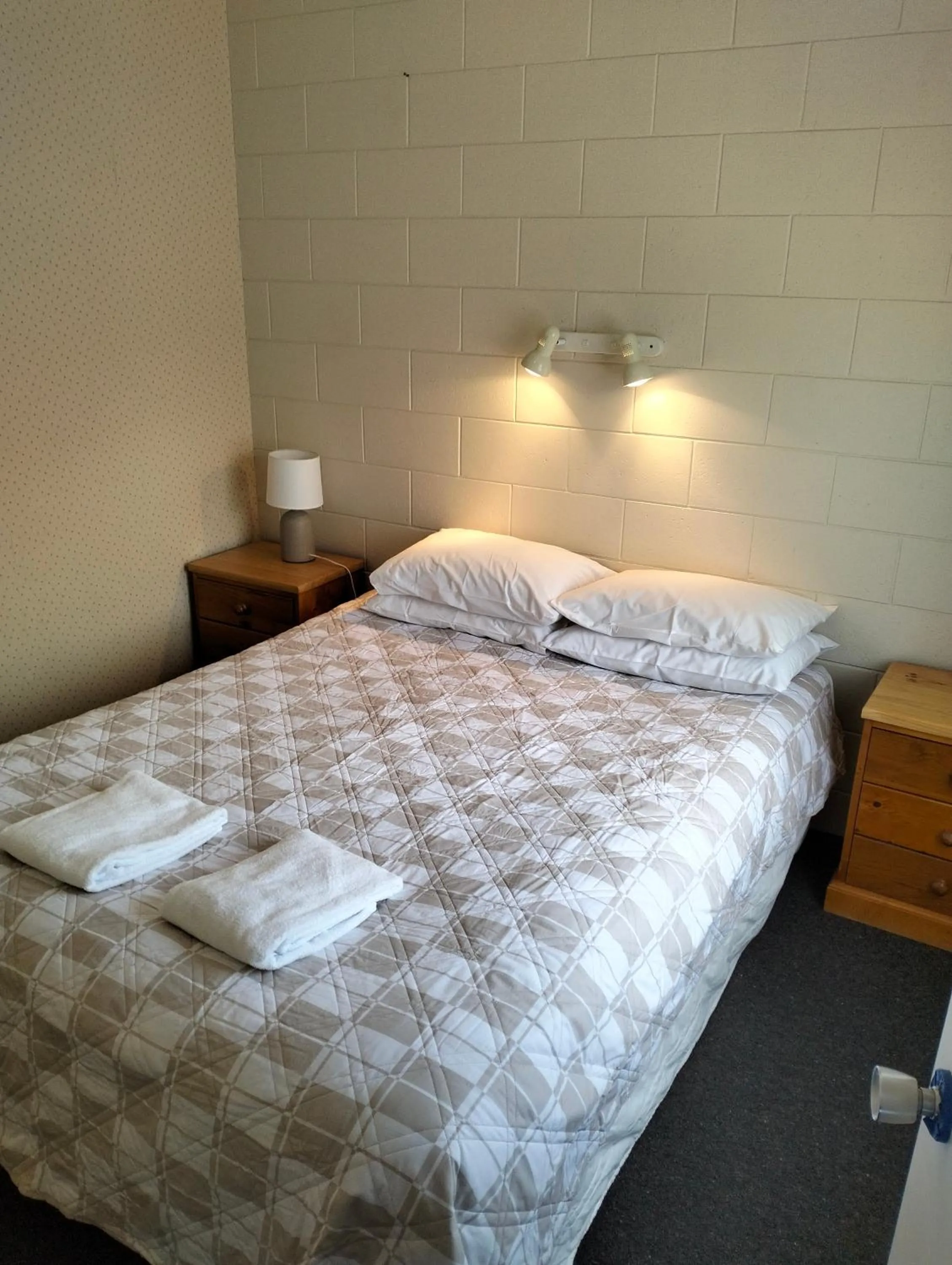 Bed in Akaroa Village Inn