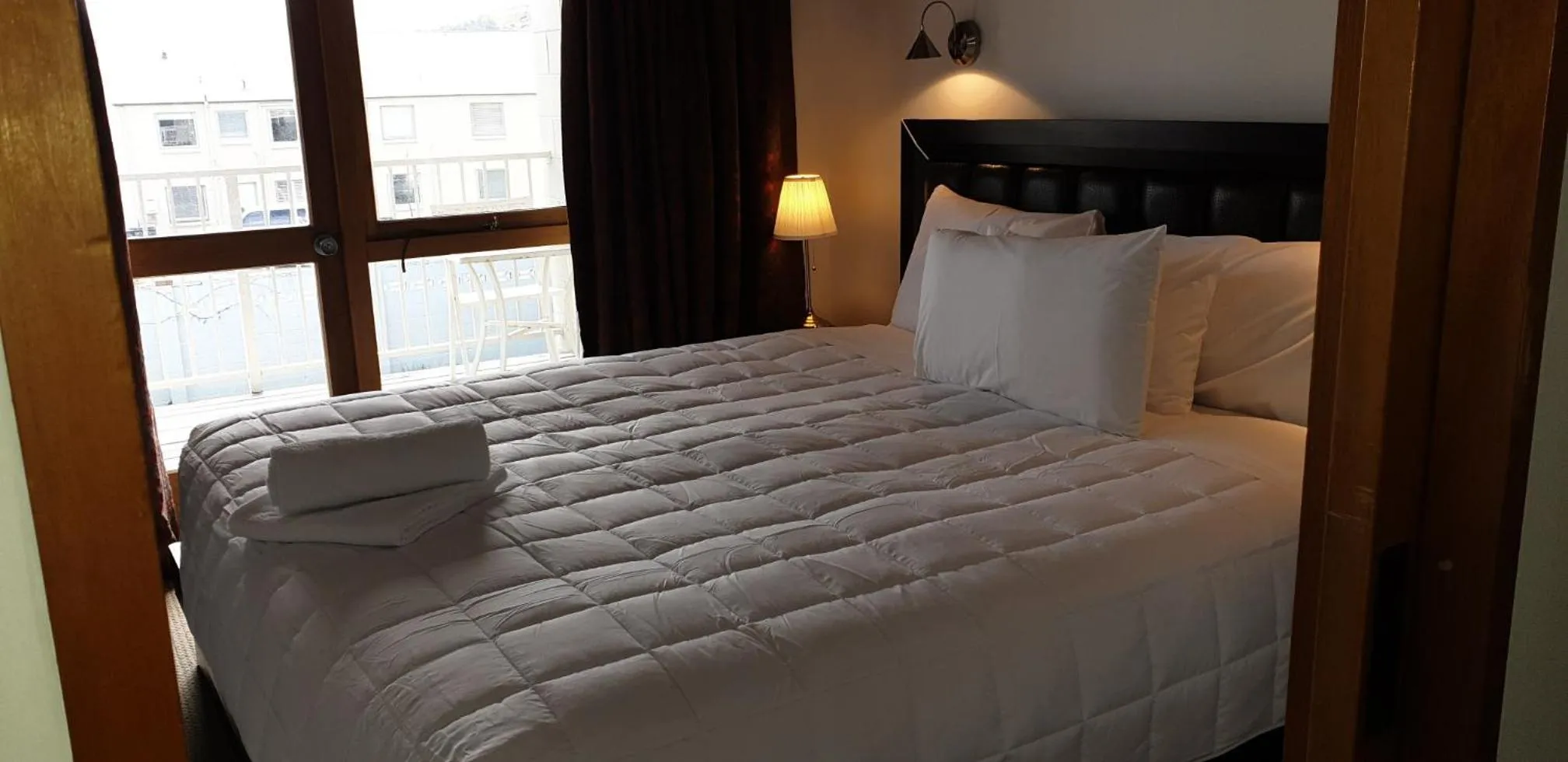 Bed in Akaroa Village Inn