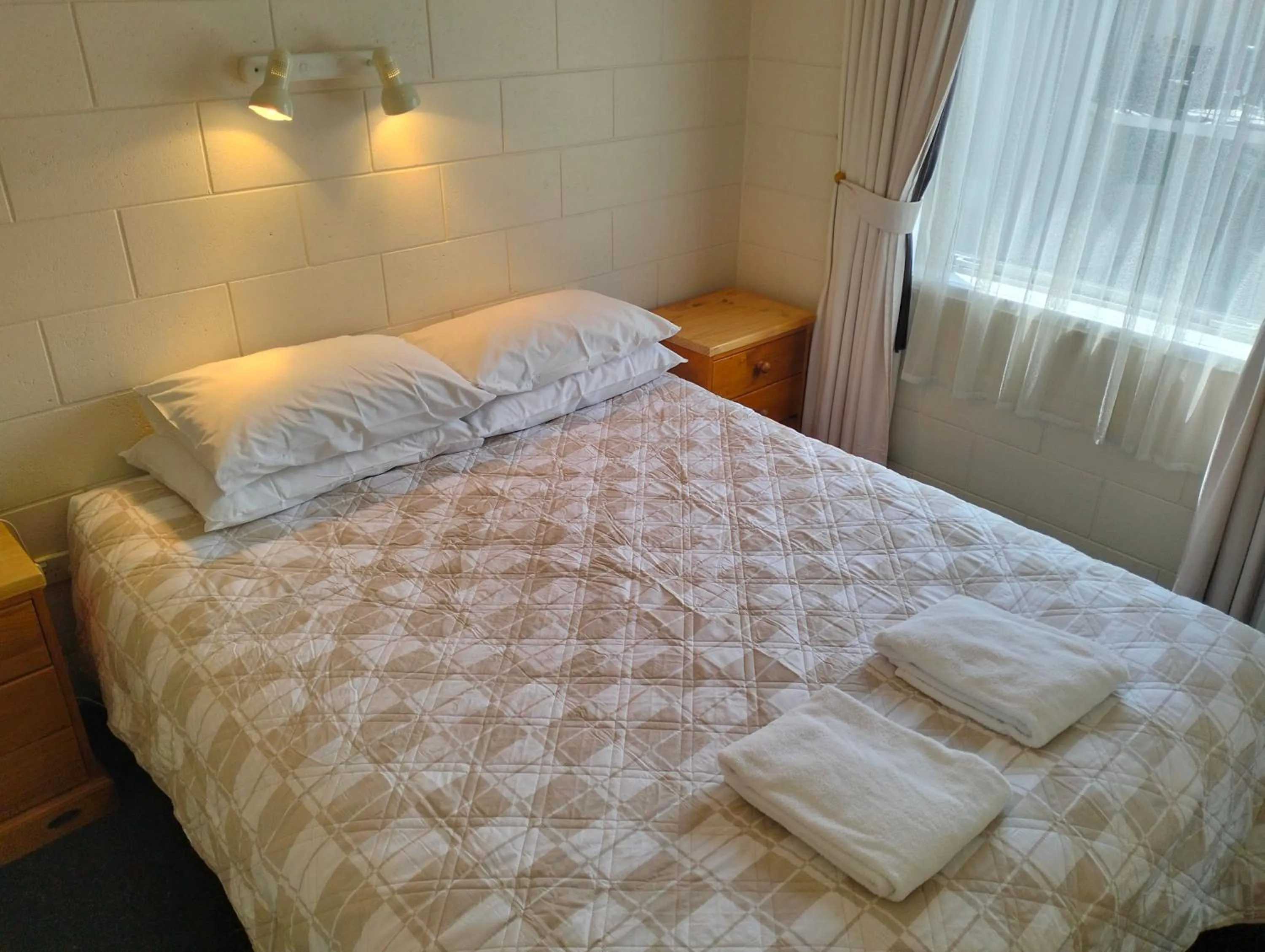 Bed in Akaroa Village Inn