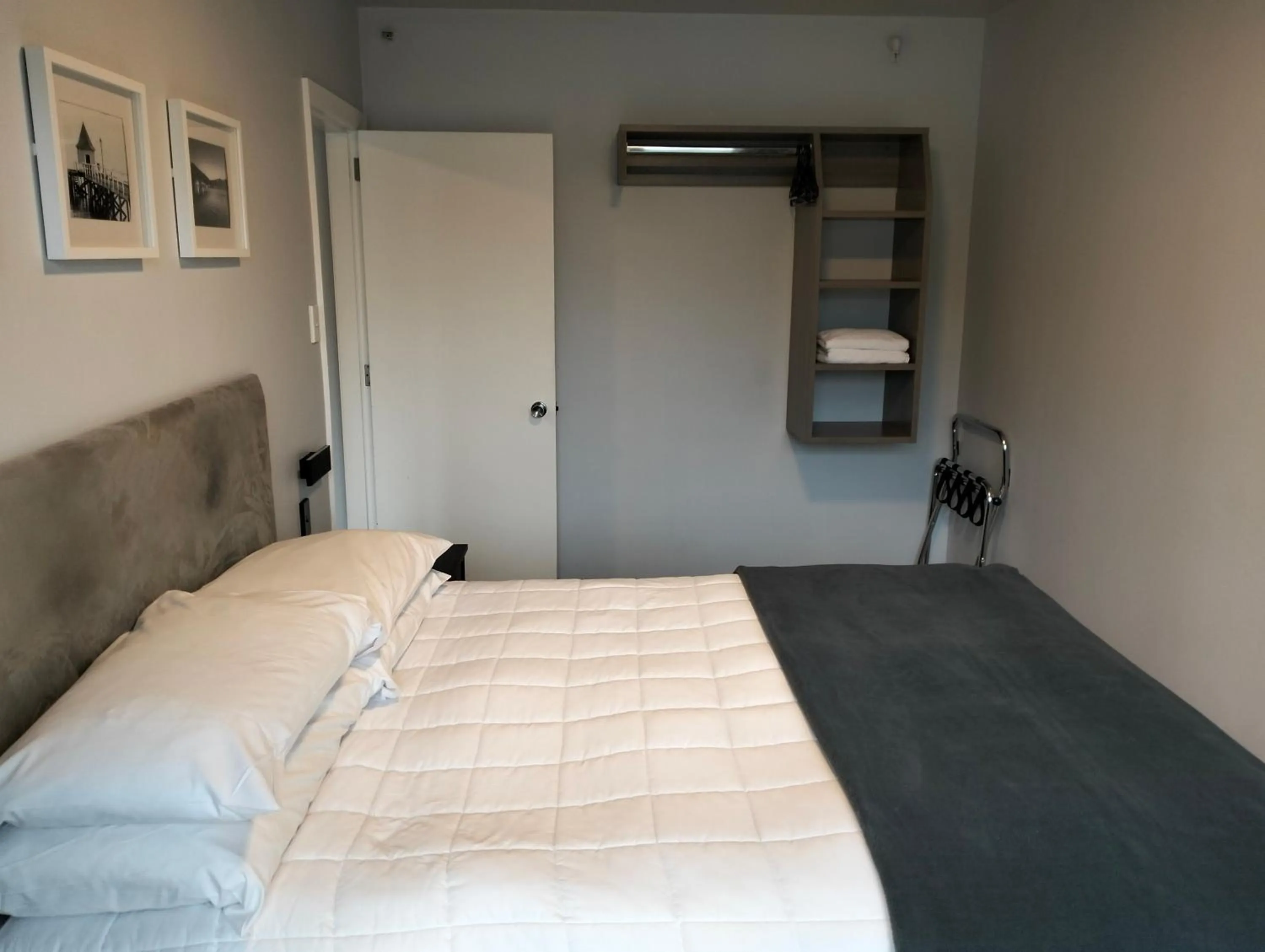 Bed in Akaroa Village Inn