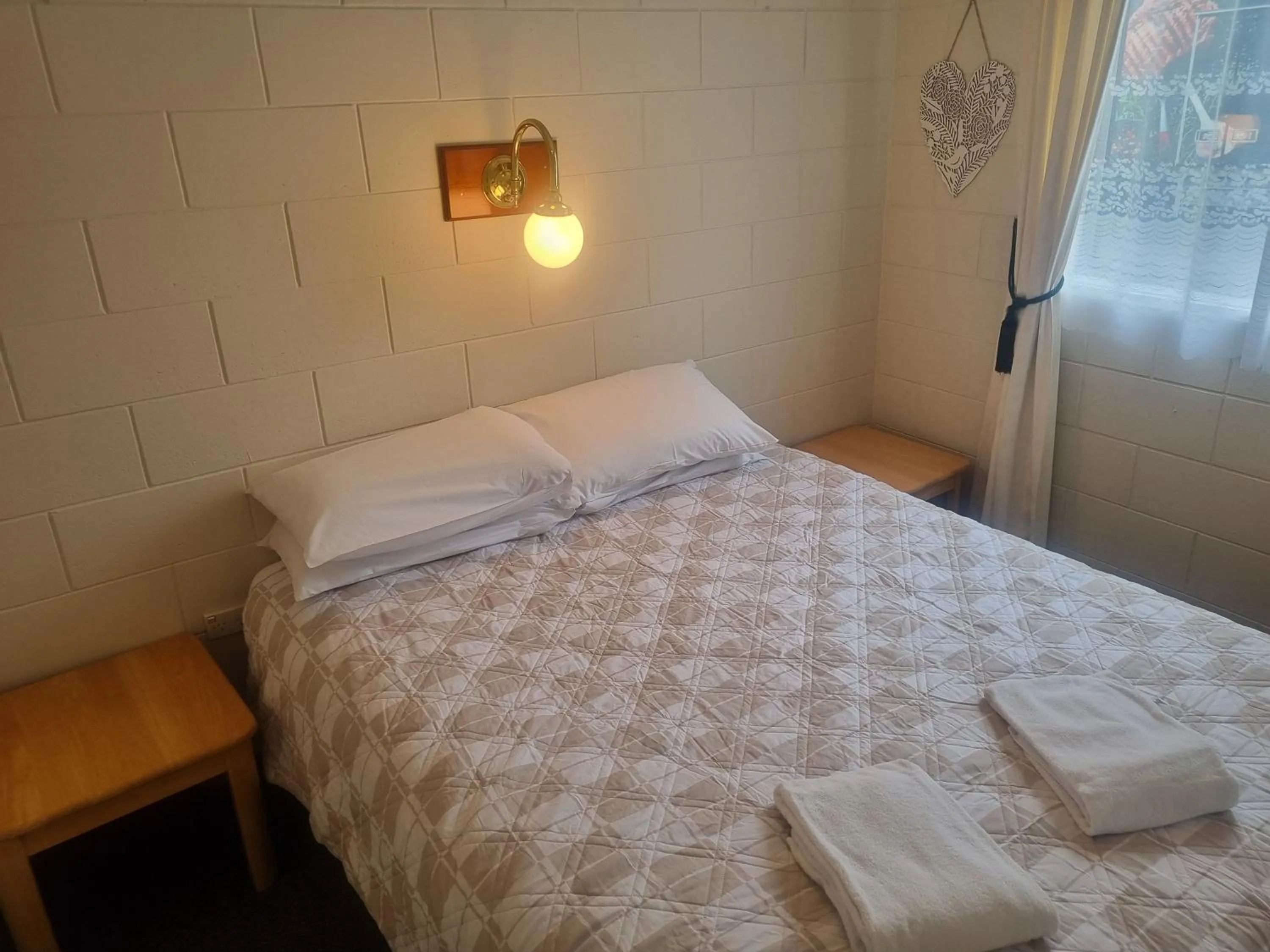 Bed in Akaroa Village Inn