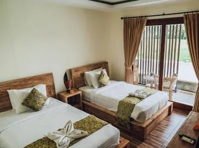Bed in The Sawah Resort & Villa