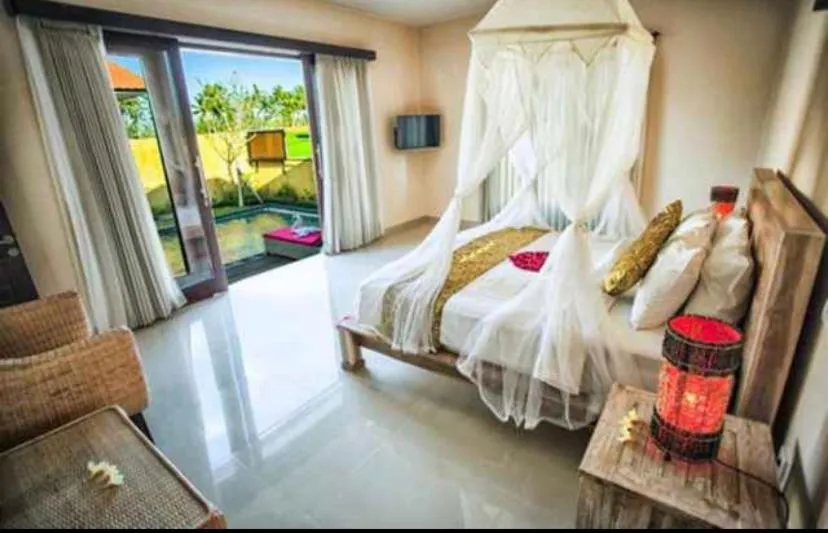 Bed in The Sawah Resort & Villa