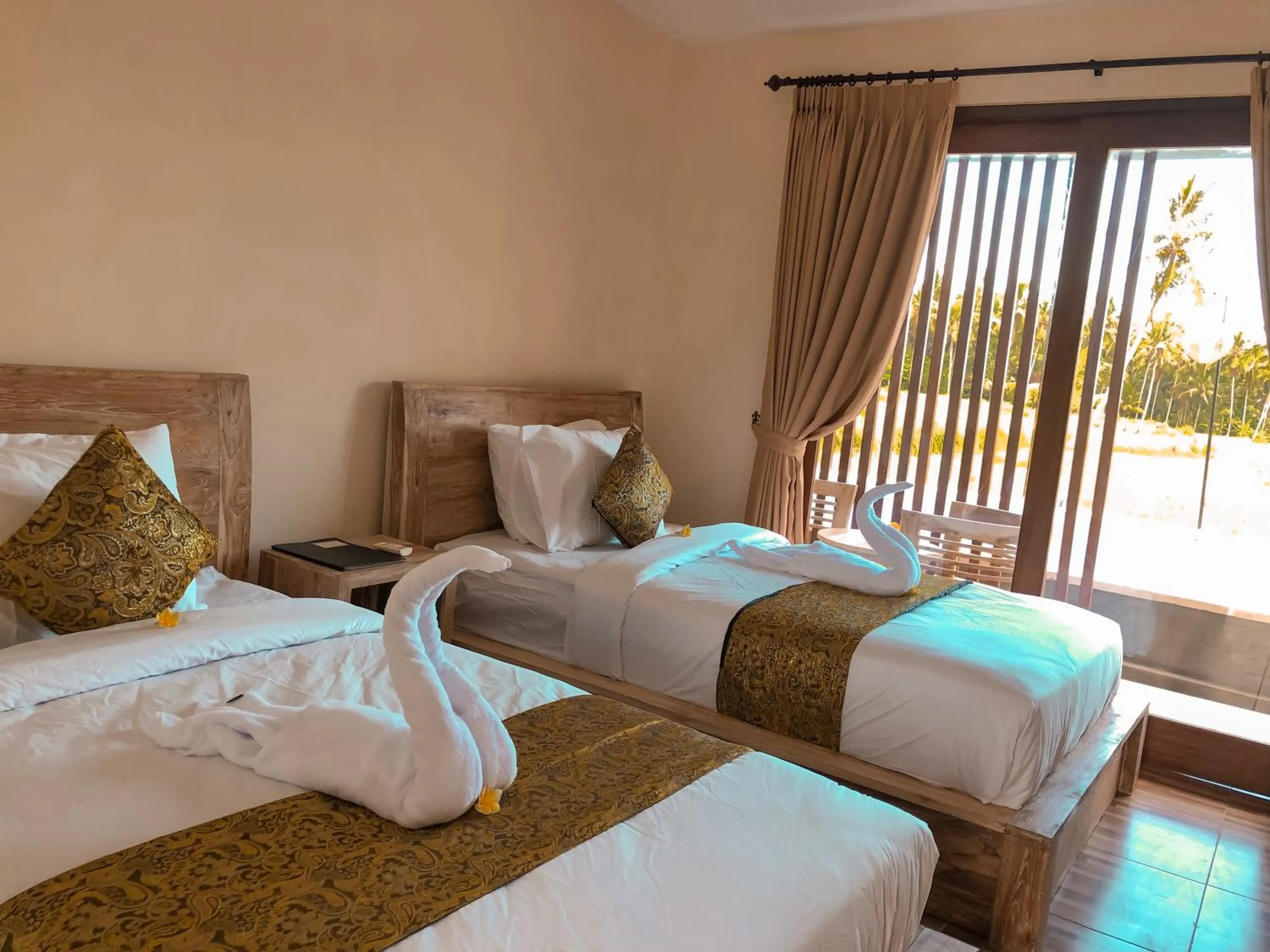 Bed in The Sawah Resort & Villa