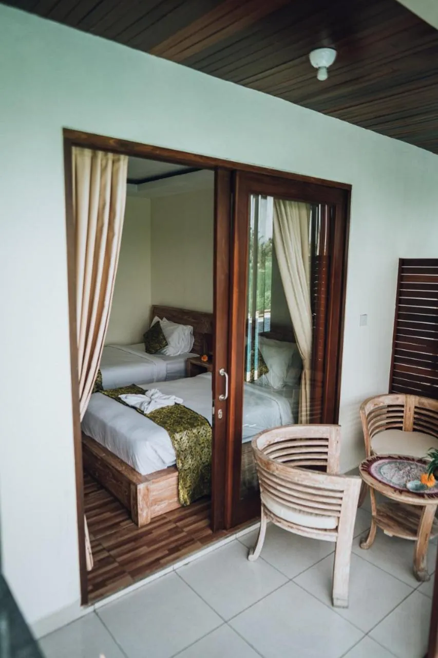 Bed in The Sawah Resort & Villa