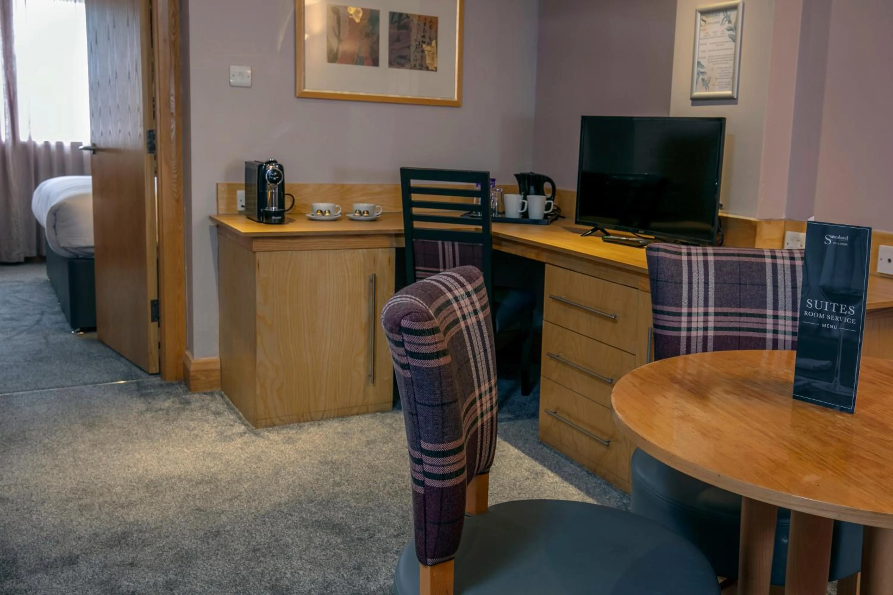 Seating area, Bed in Best Western Premier Knowsley Suites Hotel & Spa