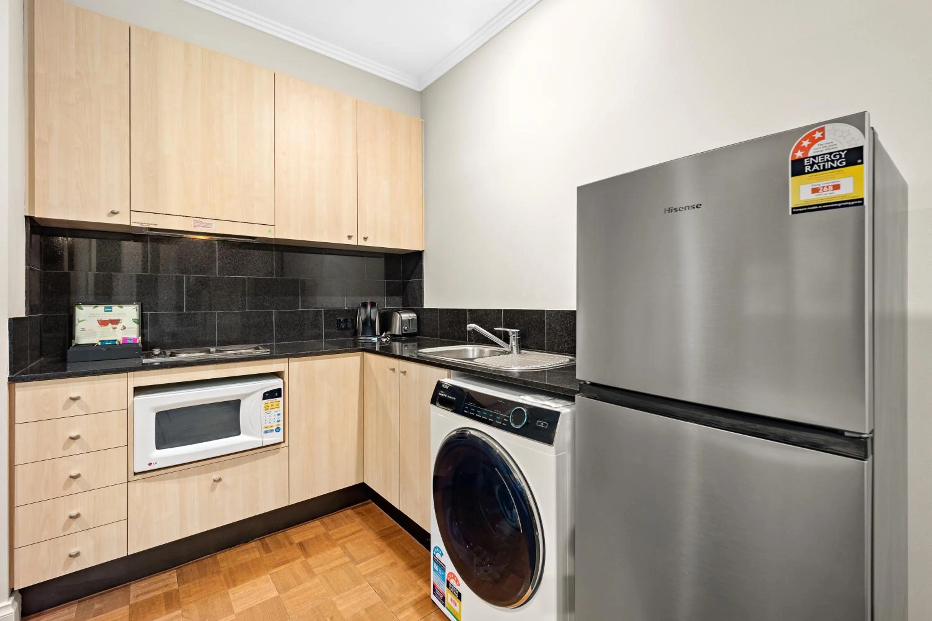 Kitchen or kitchenette in Melbourne City Suites