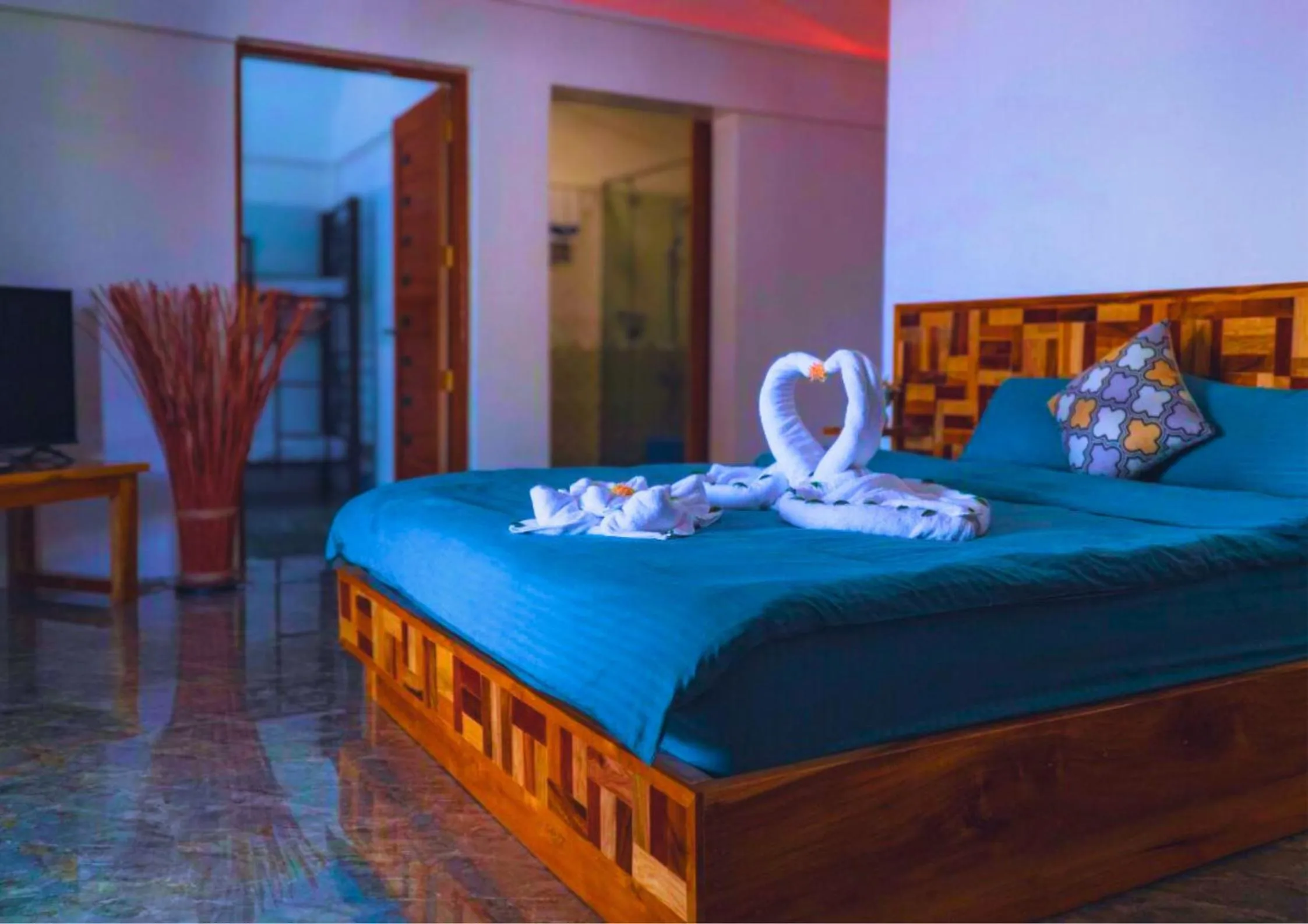 Bed in The Blessed Purple Bamboo Beach Resort