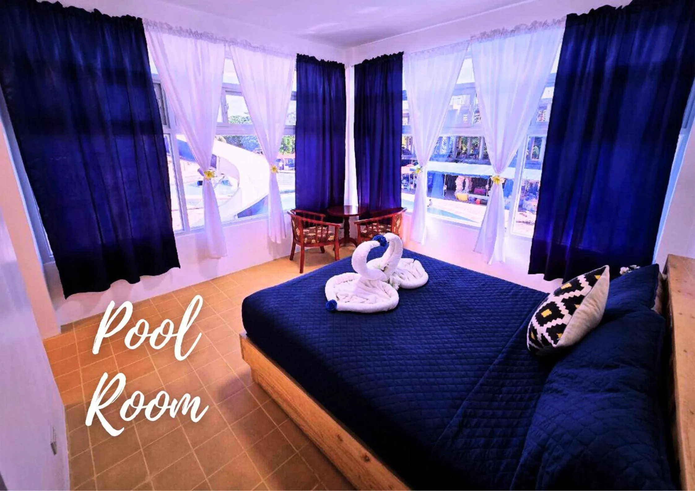 Bed in The Blessed Purple Bamboo Beach Resort