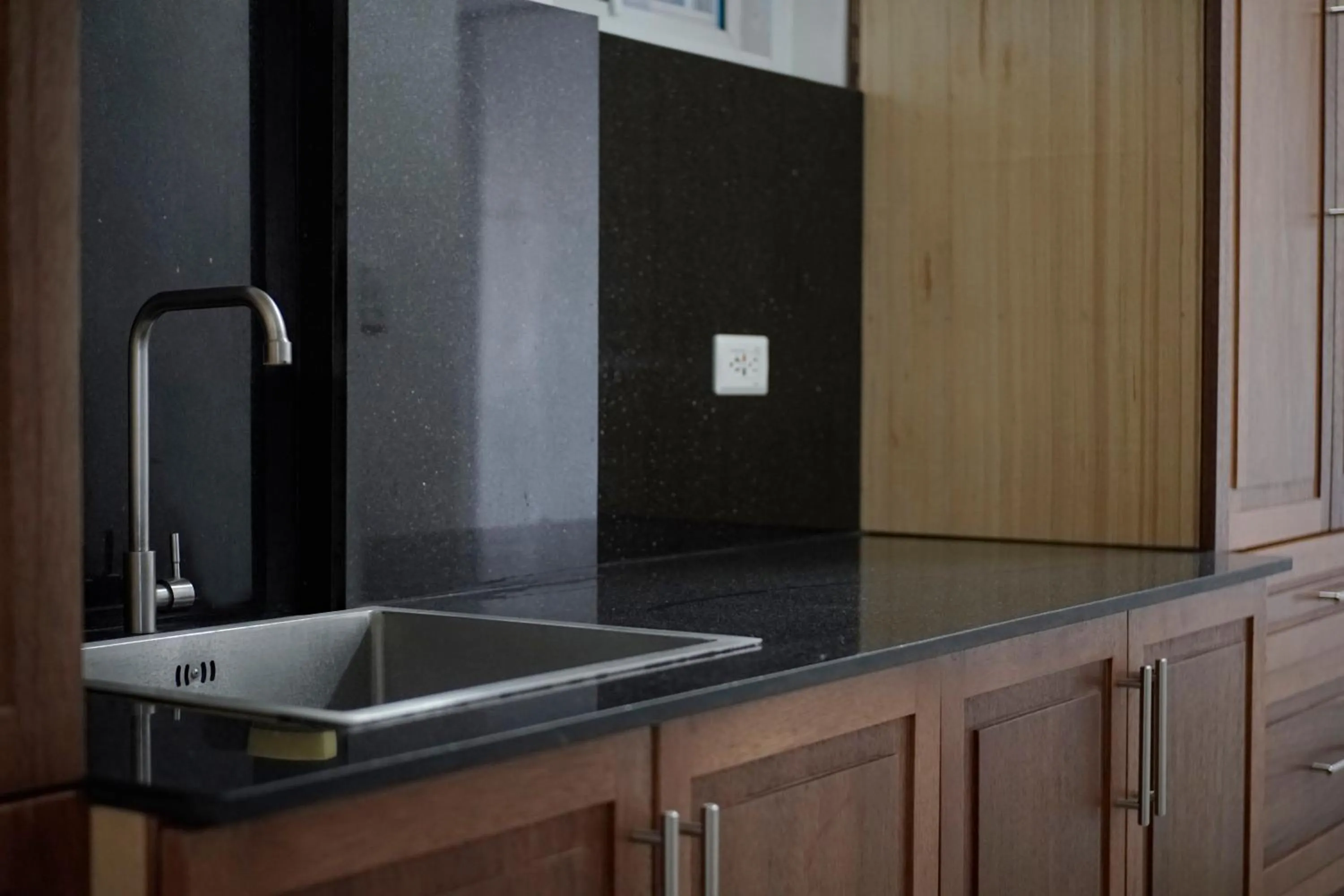 Kitchen or kitchenette in The Blessed Purple Bamboo Beach Resort