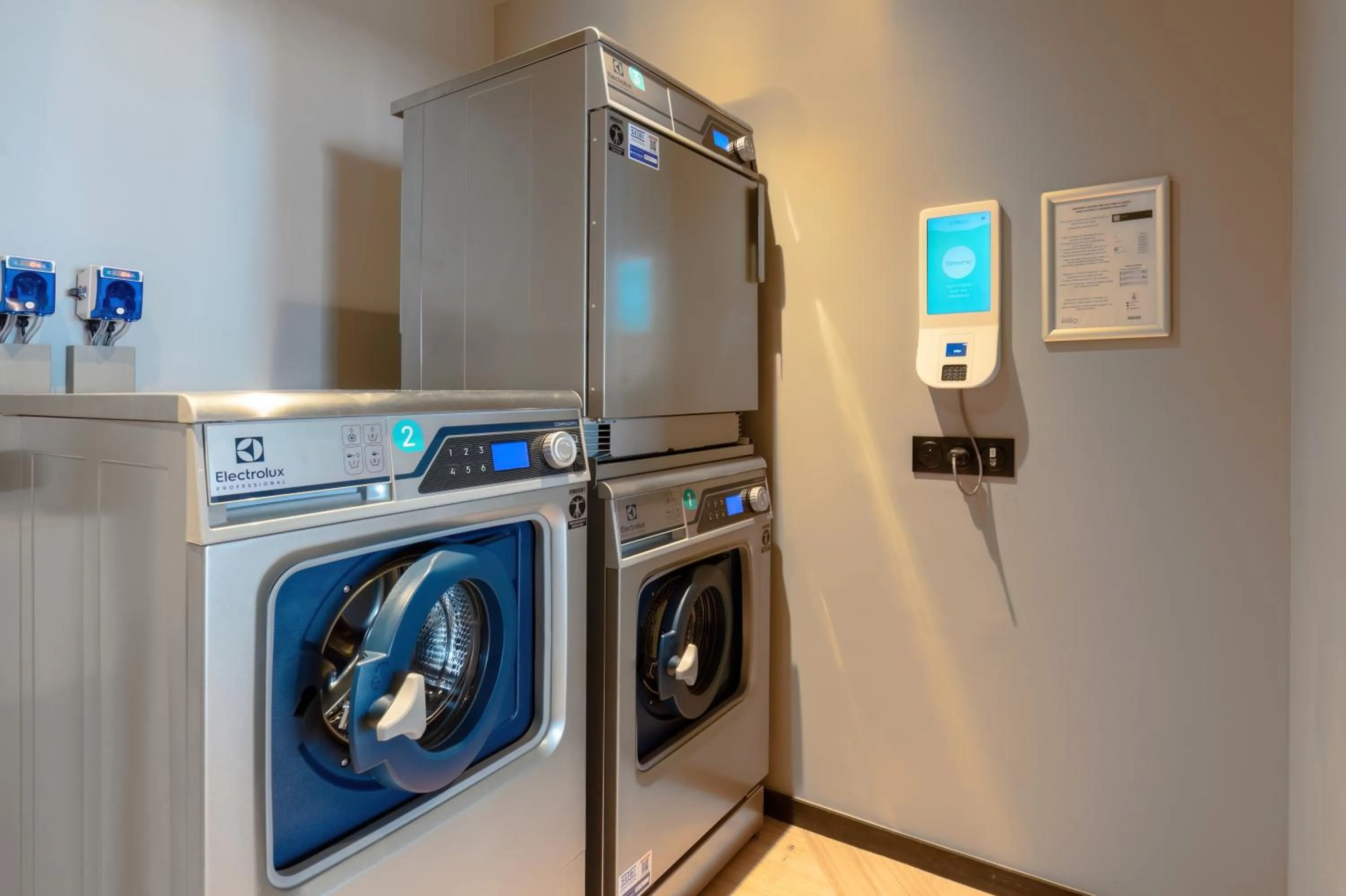 washing machine in Aparthotel Adagio Access Rouen Centre Cathédrale