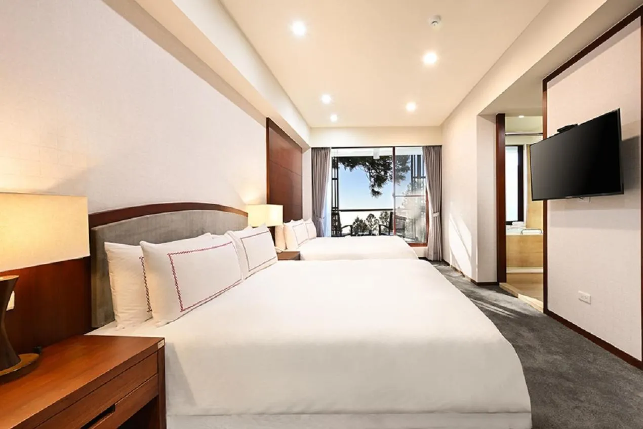 Bed in Alishan Hotel