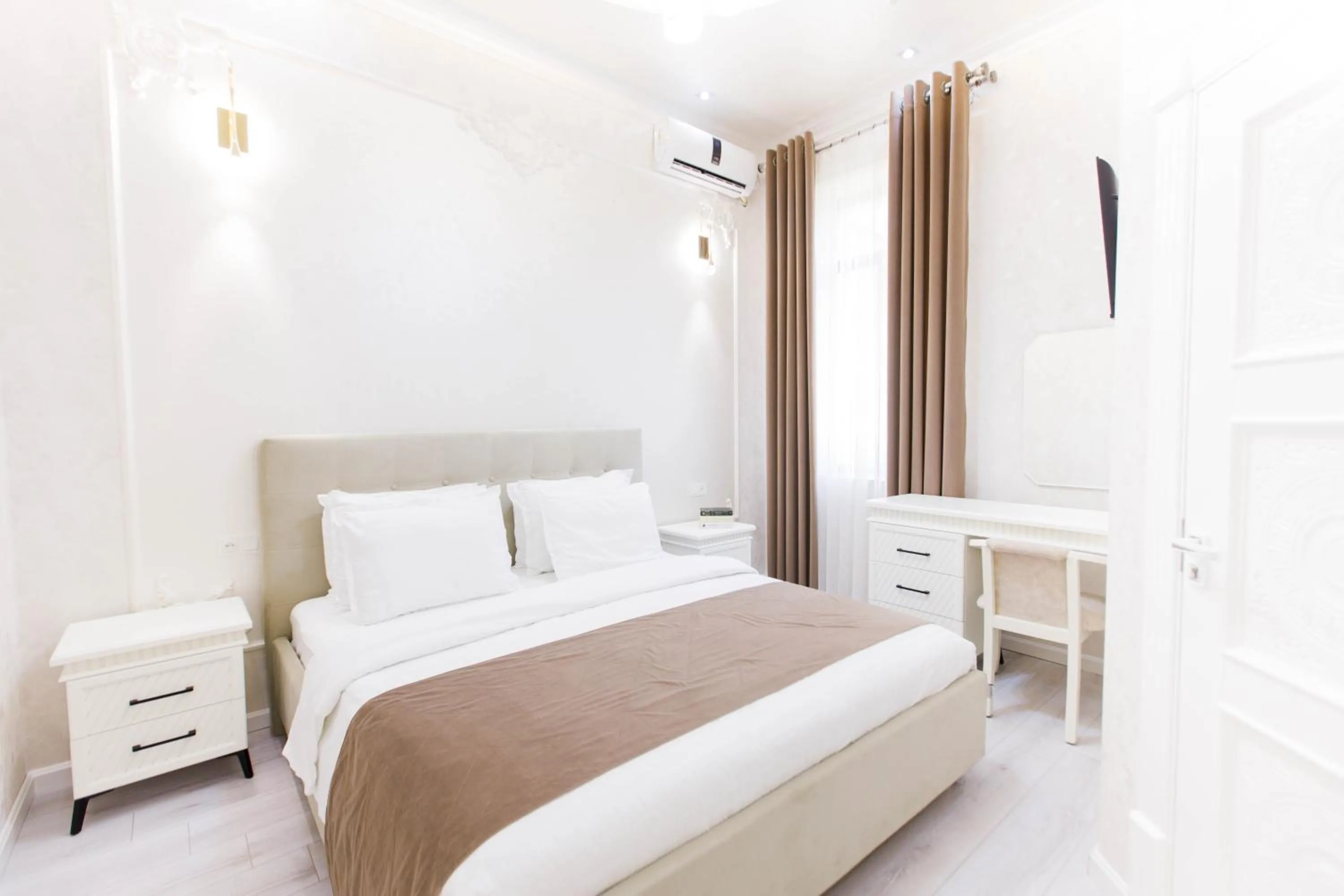 Bed in Hotel Dali Samarkand