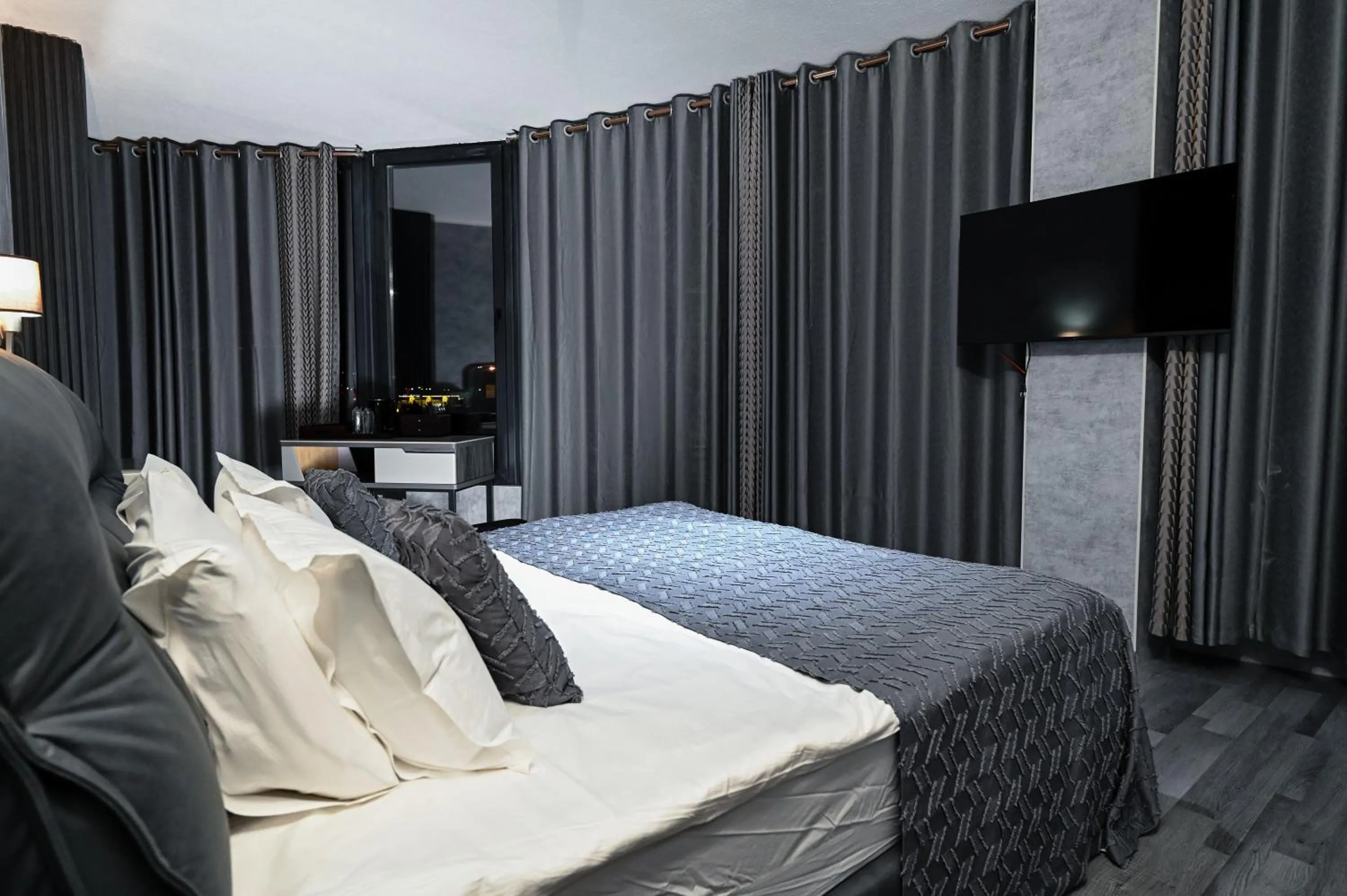 Bed in Grey Star Hotel